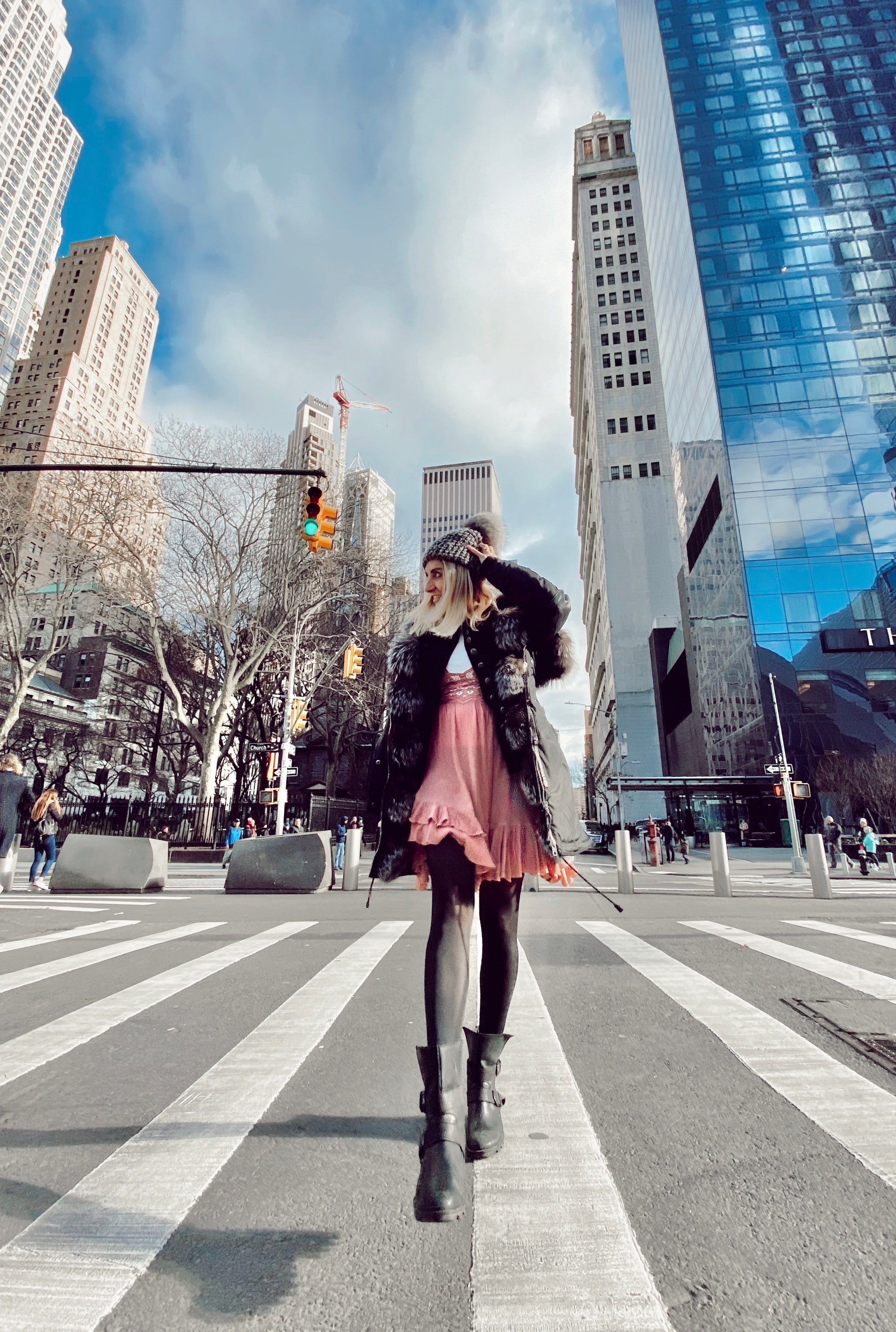 woman crossing the street in new york