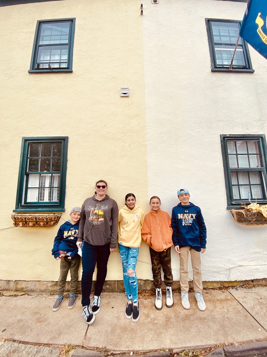 kids standing outside building