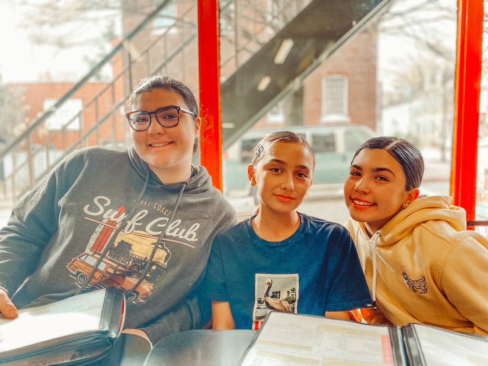 three girls at restaurant