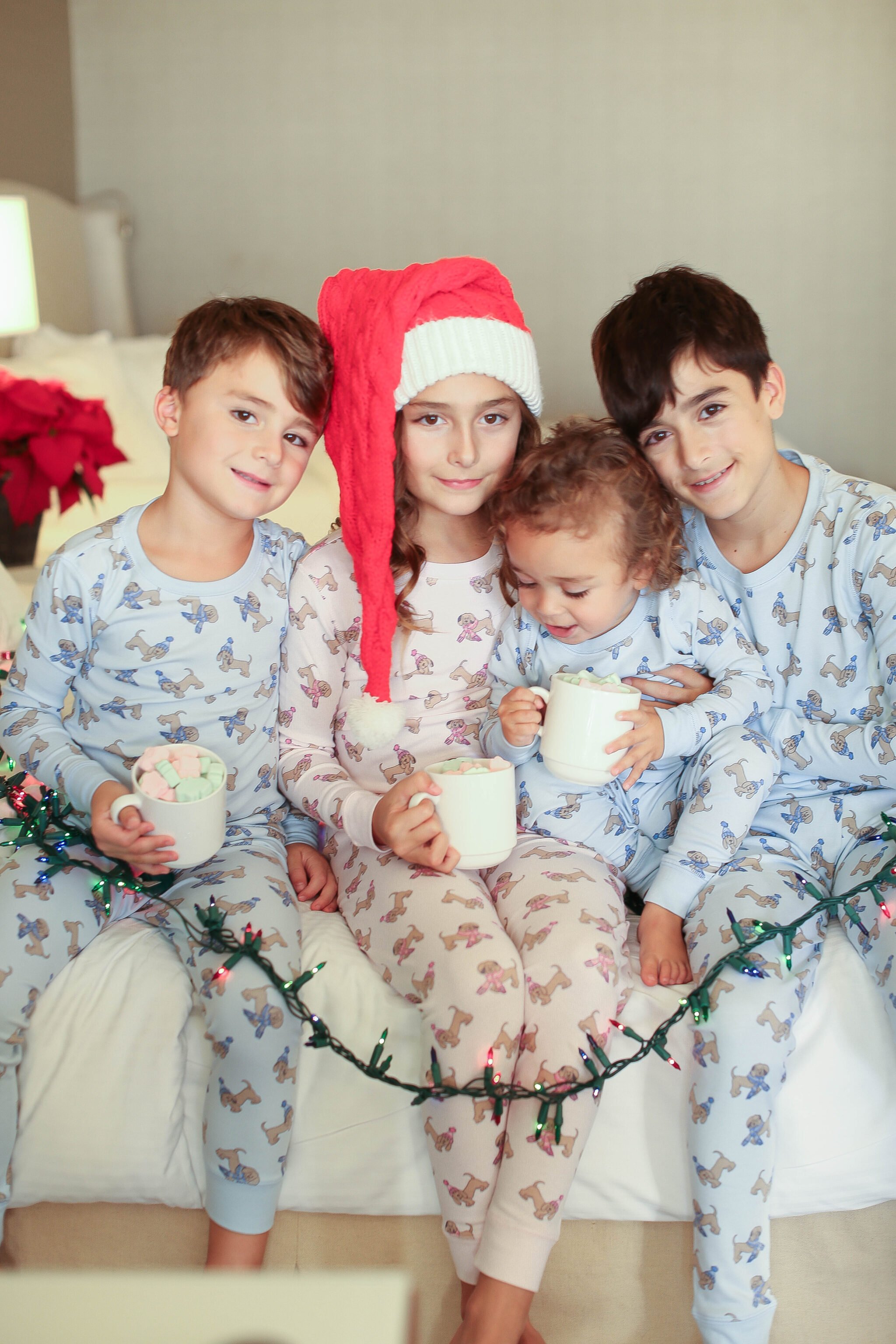 kids in pajamas with hot chocolate