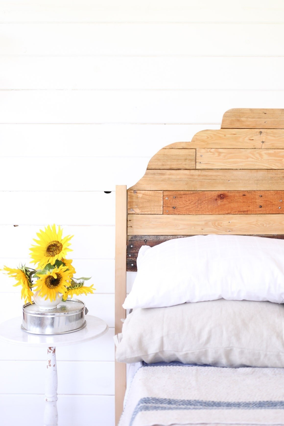 wooden bed with flowers