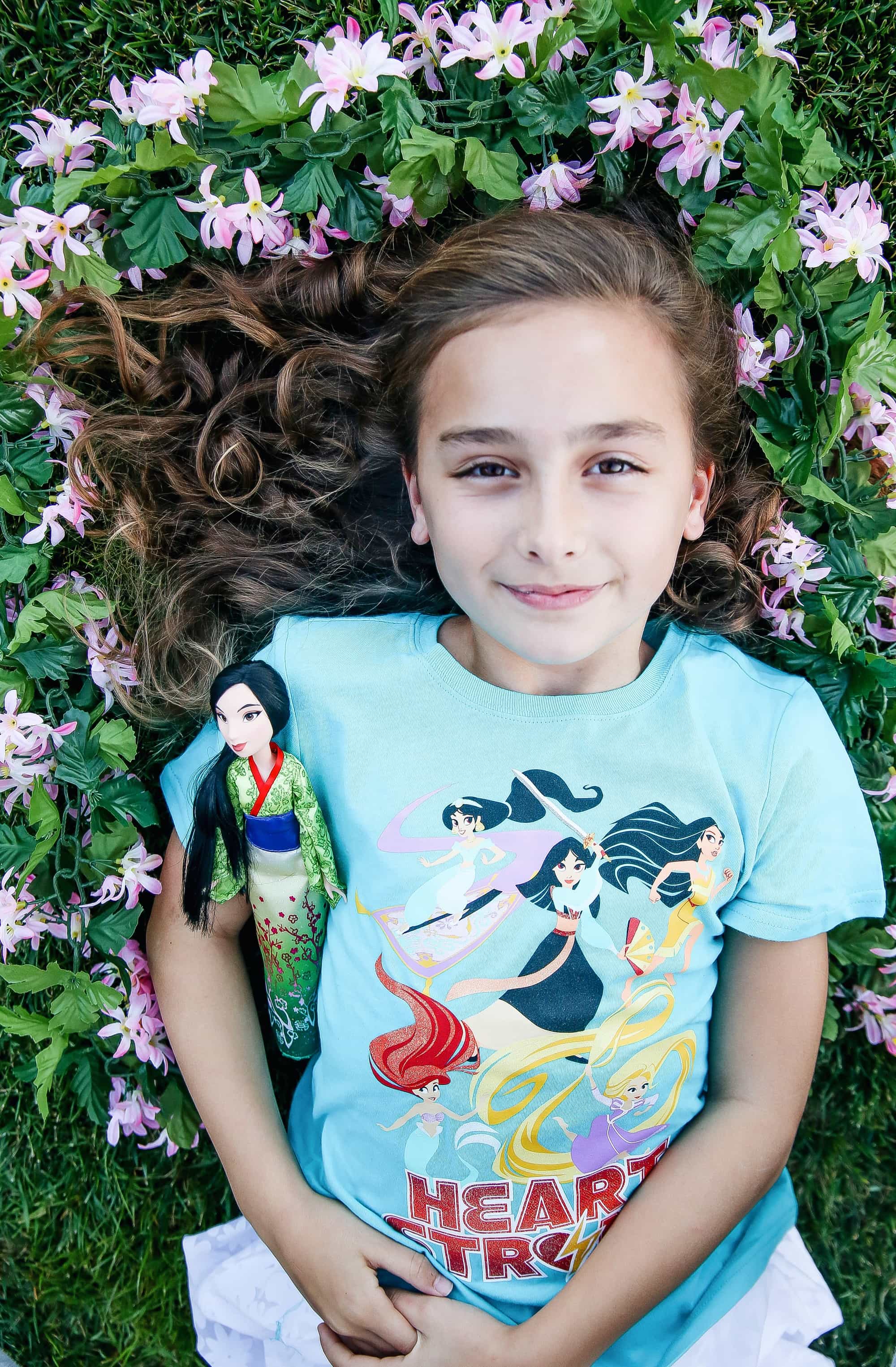 girl laying in flowers