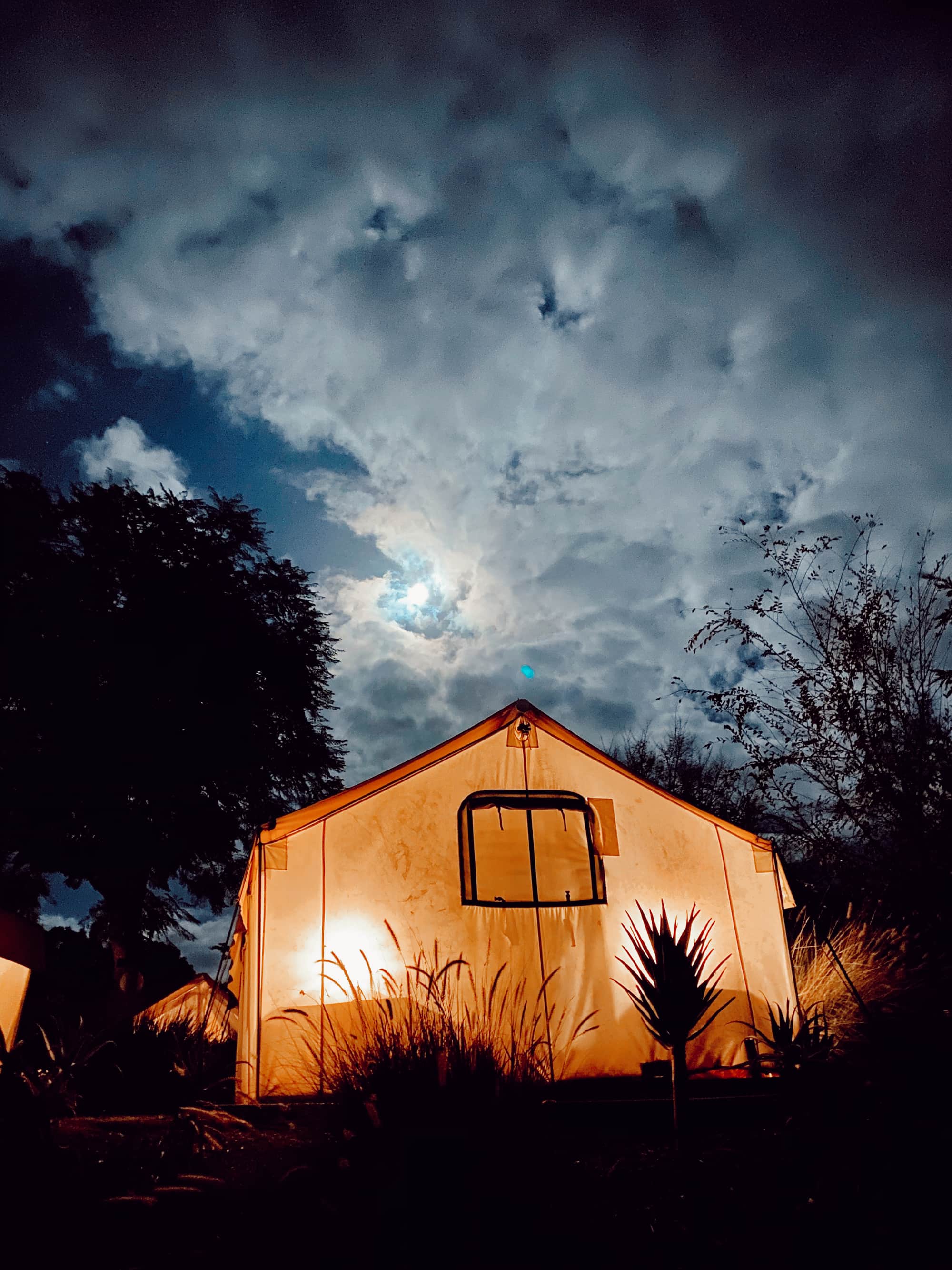 tent lit up at night