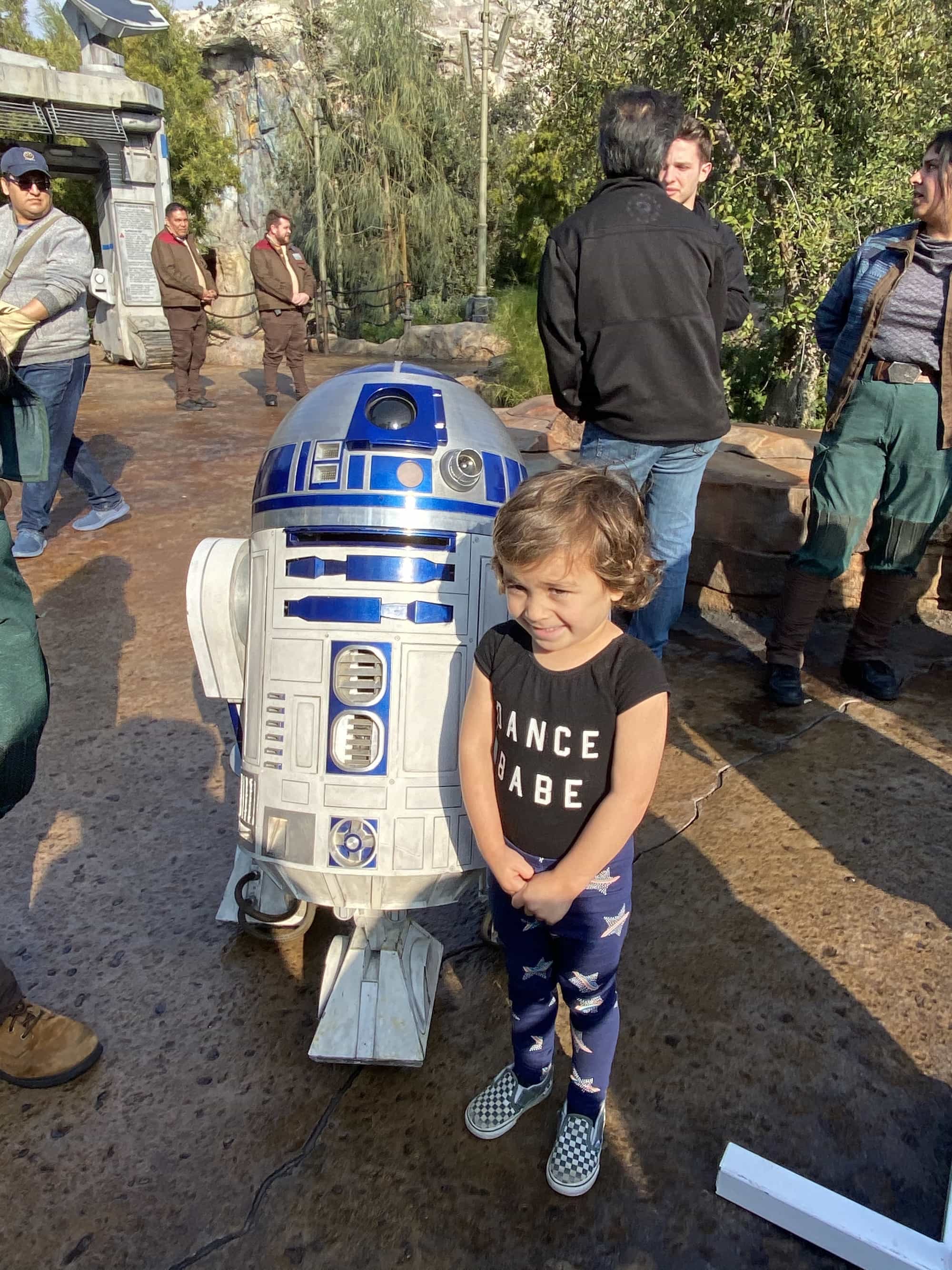 child with r2-d2 star wars