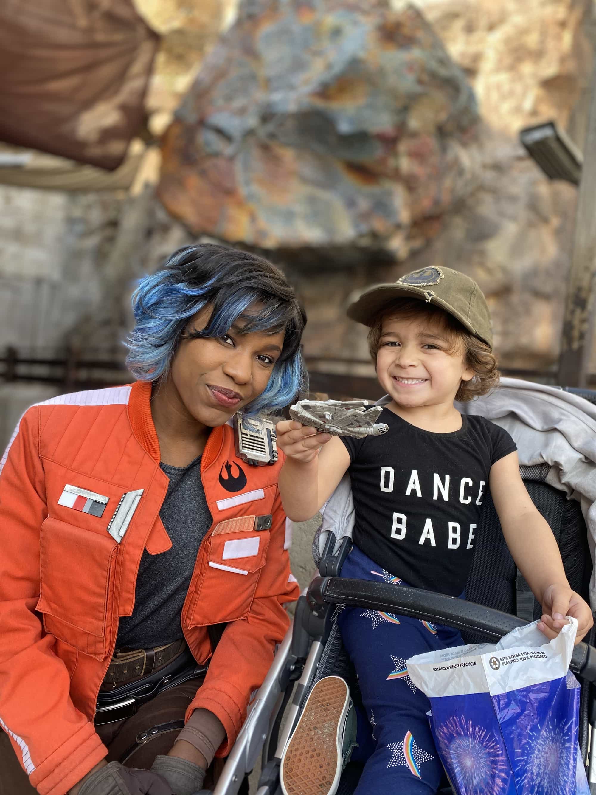 child at disneyland star wars