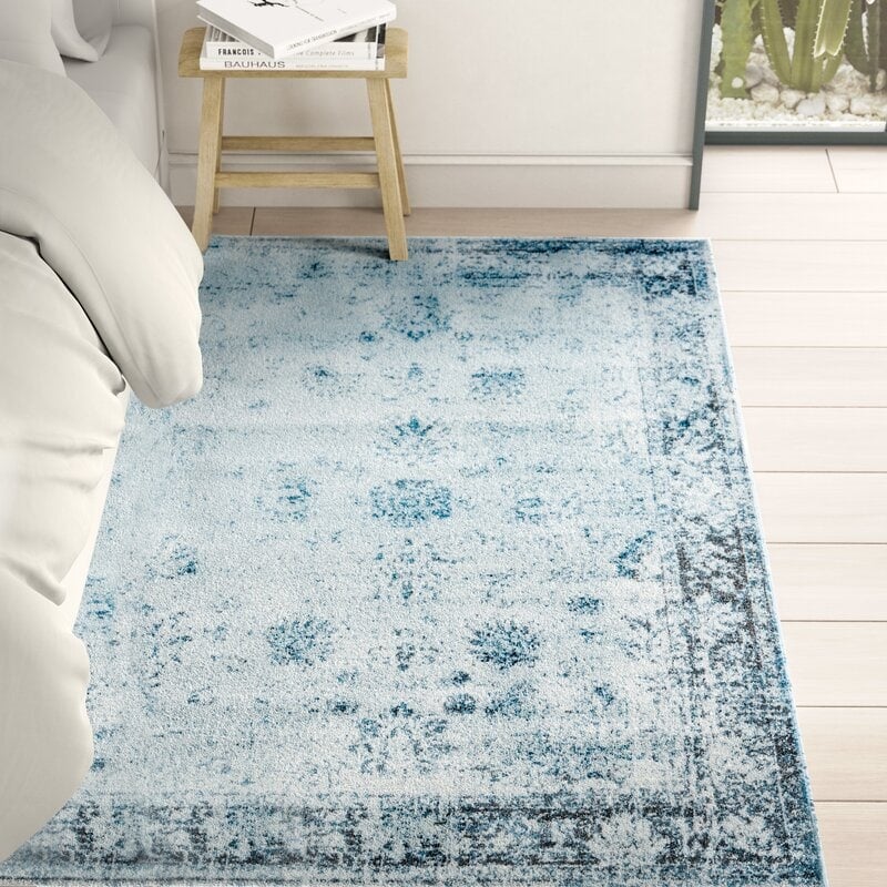 blue rug on floor