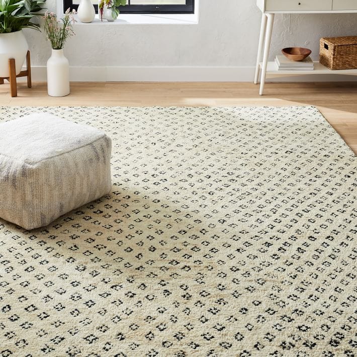 cream rug on floor