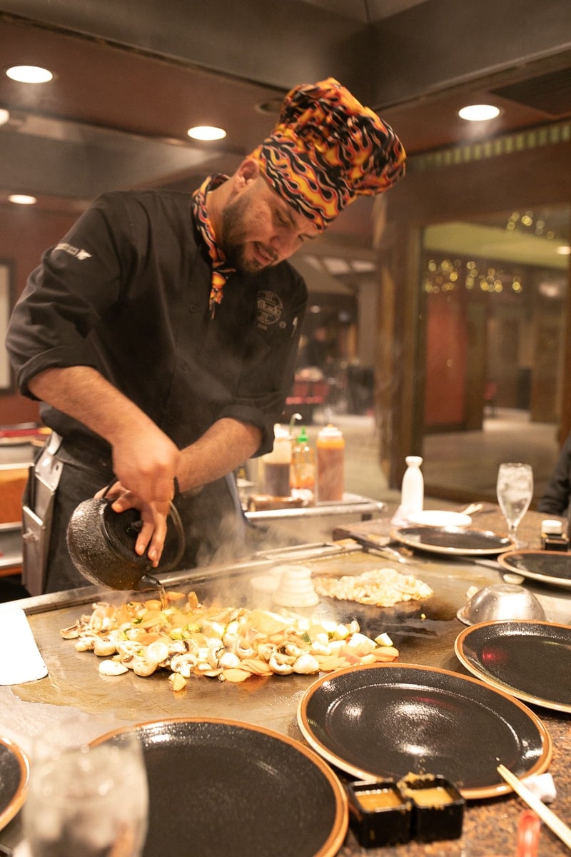 chef cooking on asian grill