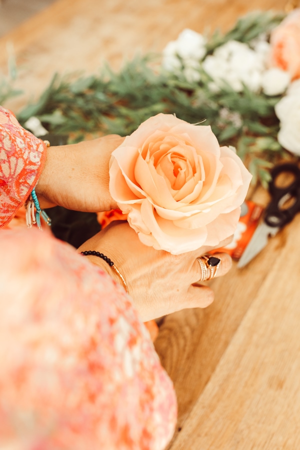 woman holding rose