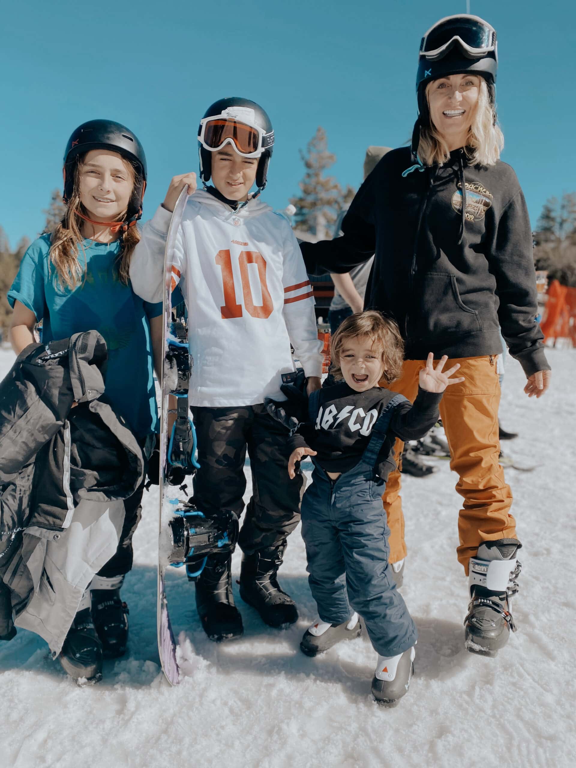 family skiing together