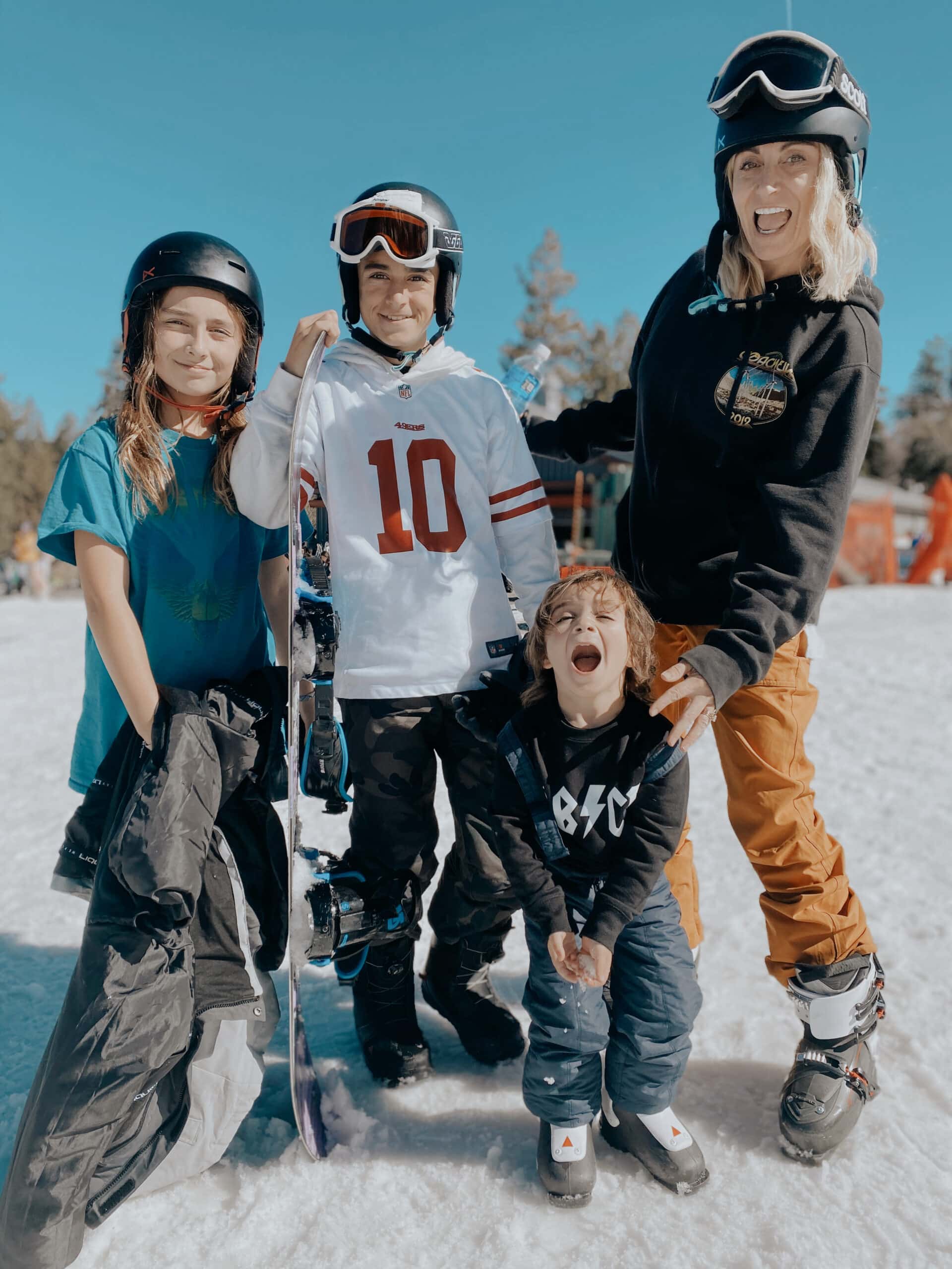 mom skiing with kids