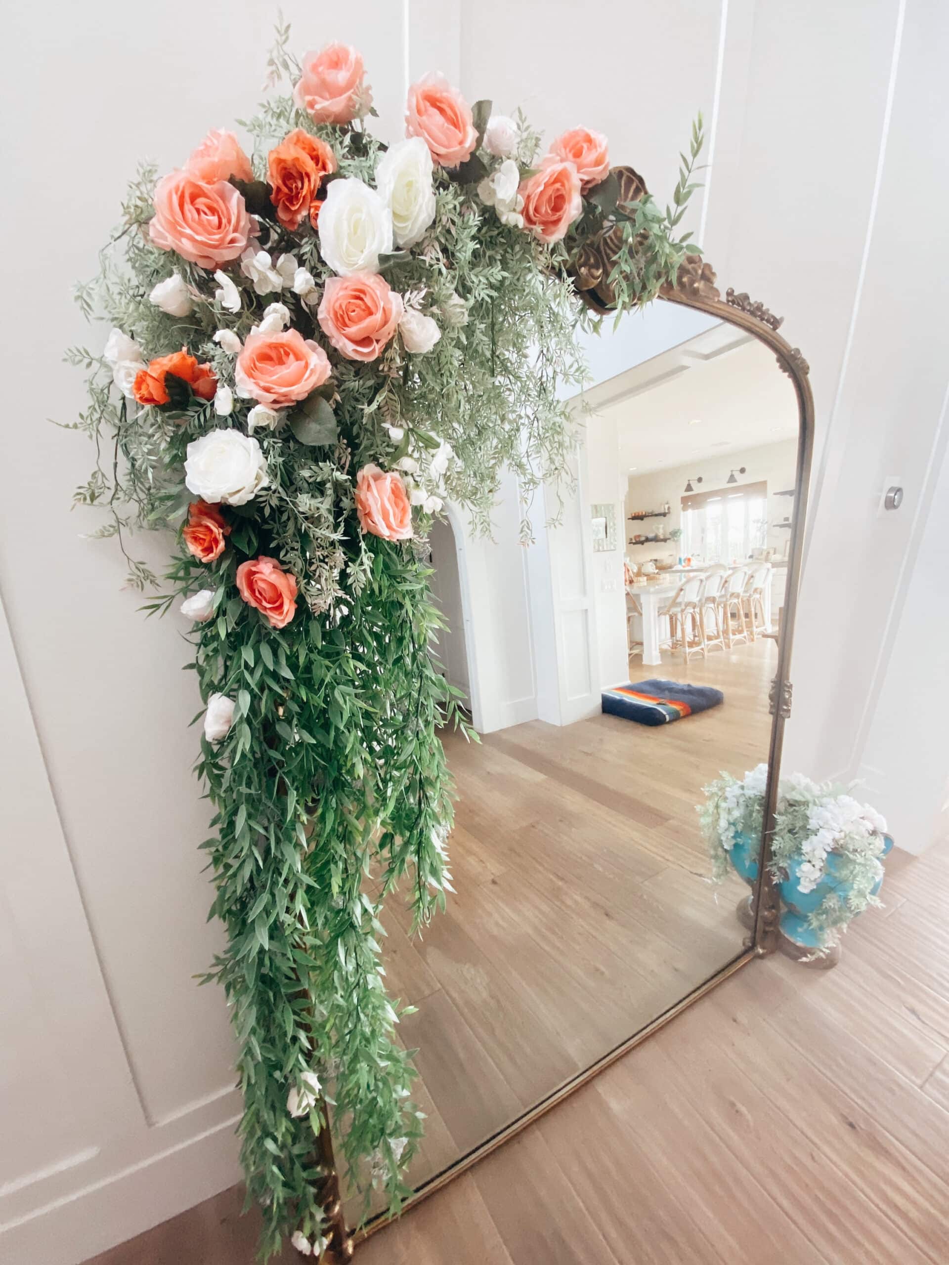 floral arrangement on mirror