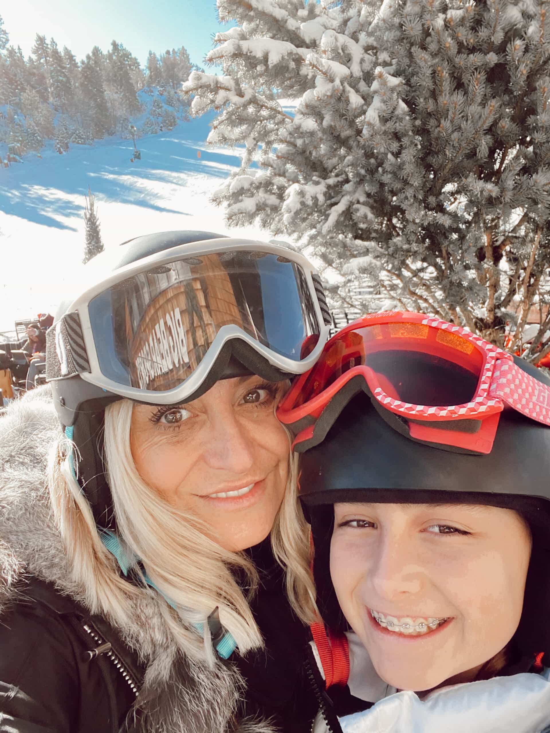 mom and daughter skiing