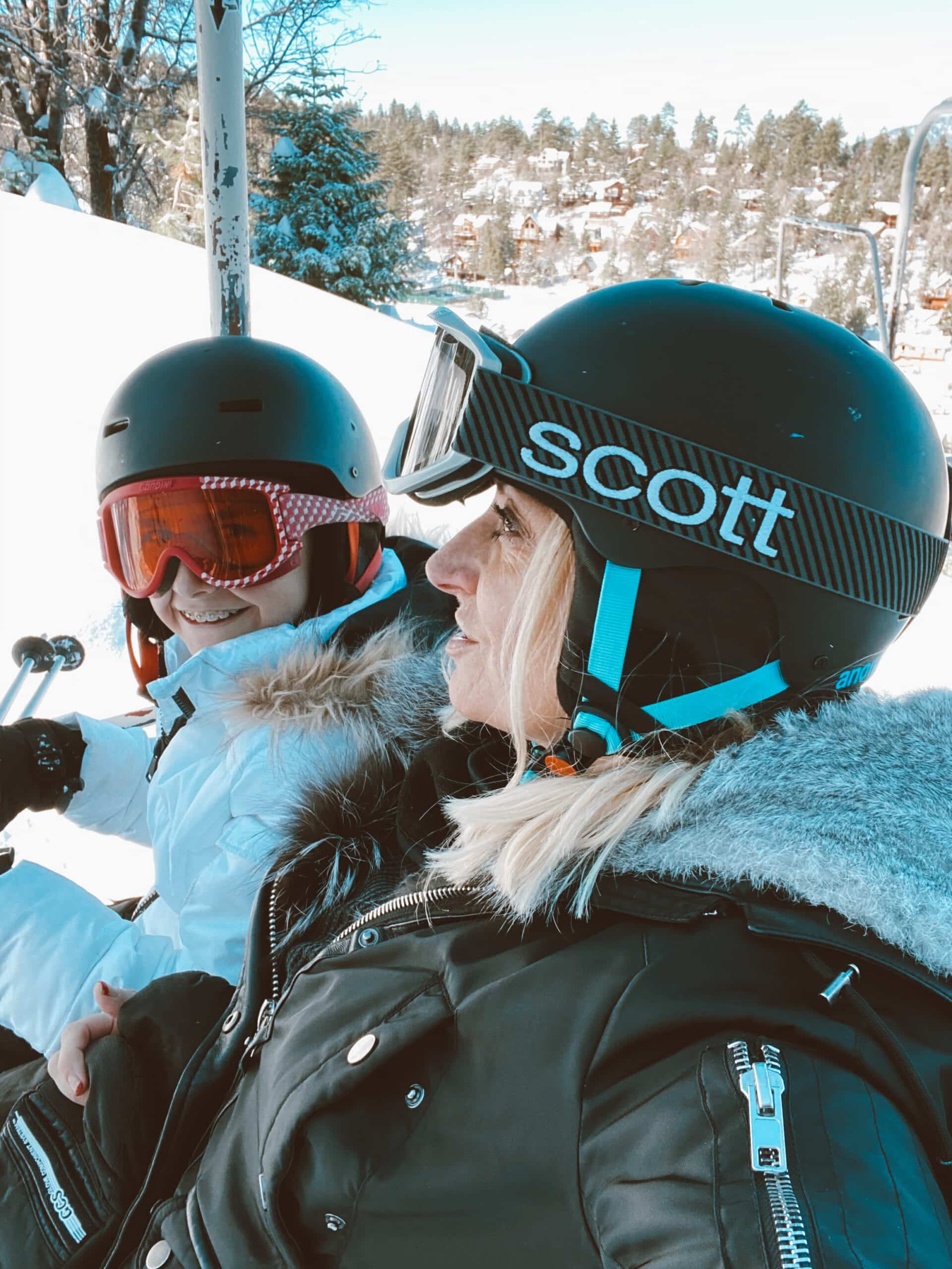 mom and daughter on ski lift