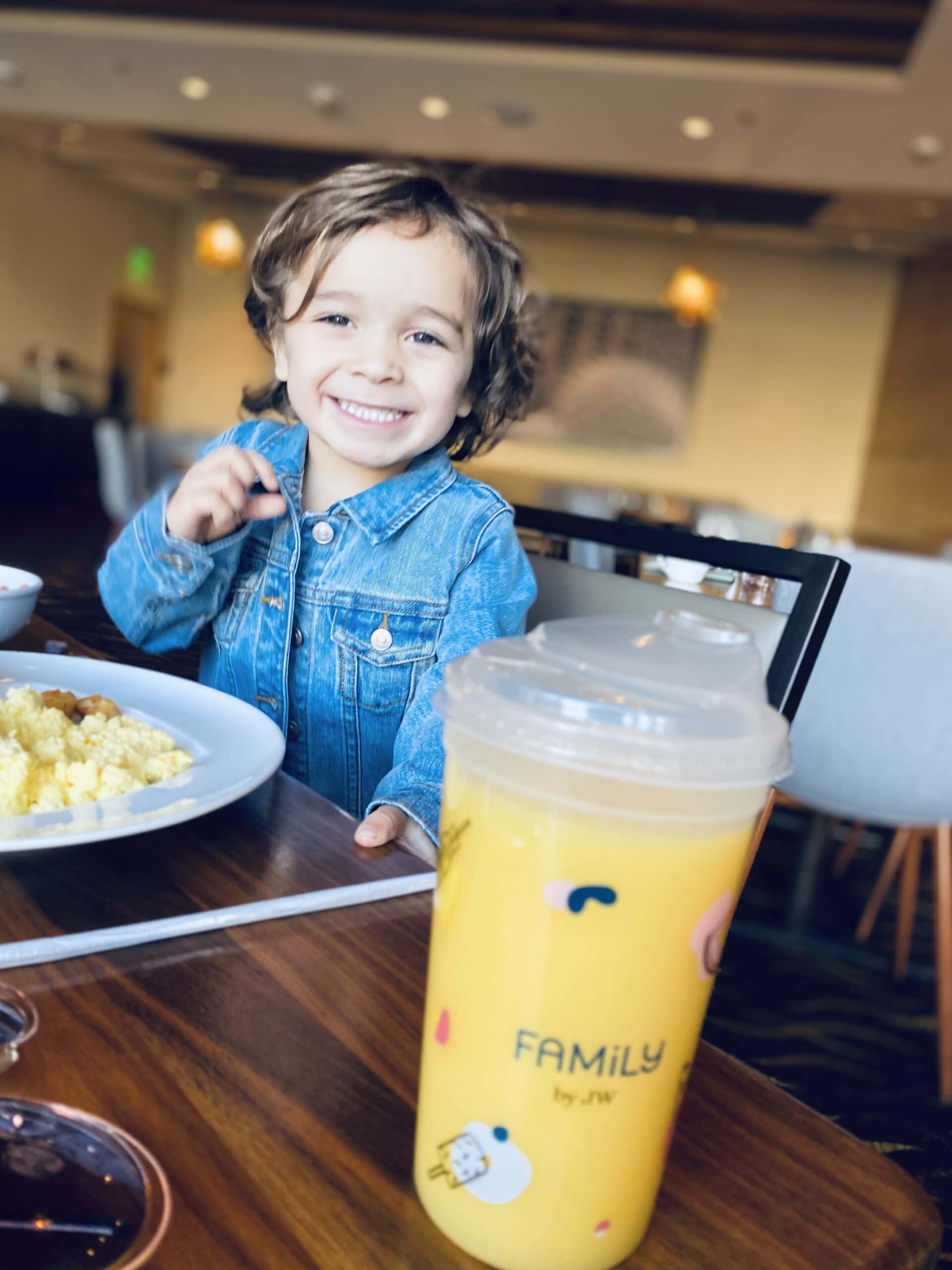 toddler eating breakfast