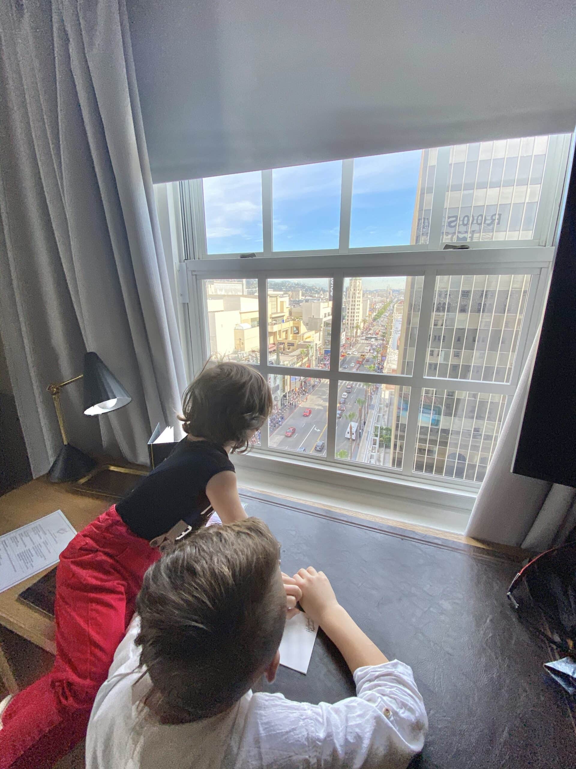 kids looking out a window