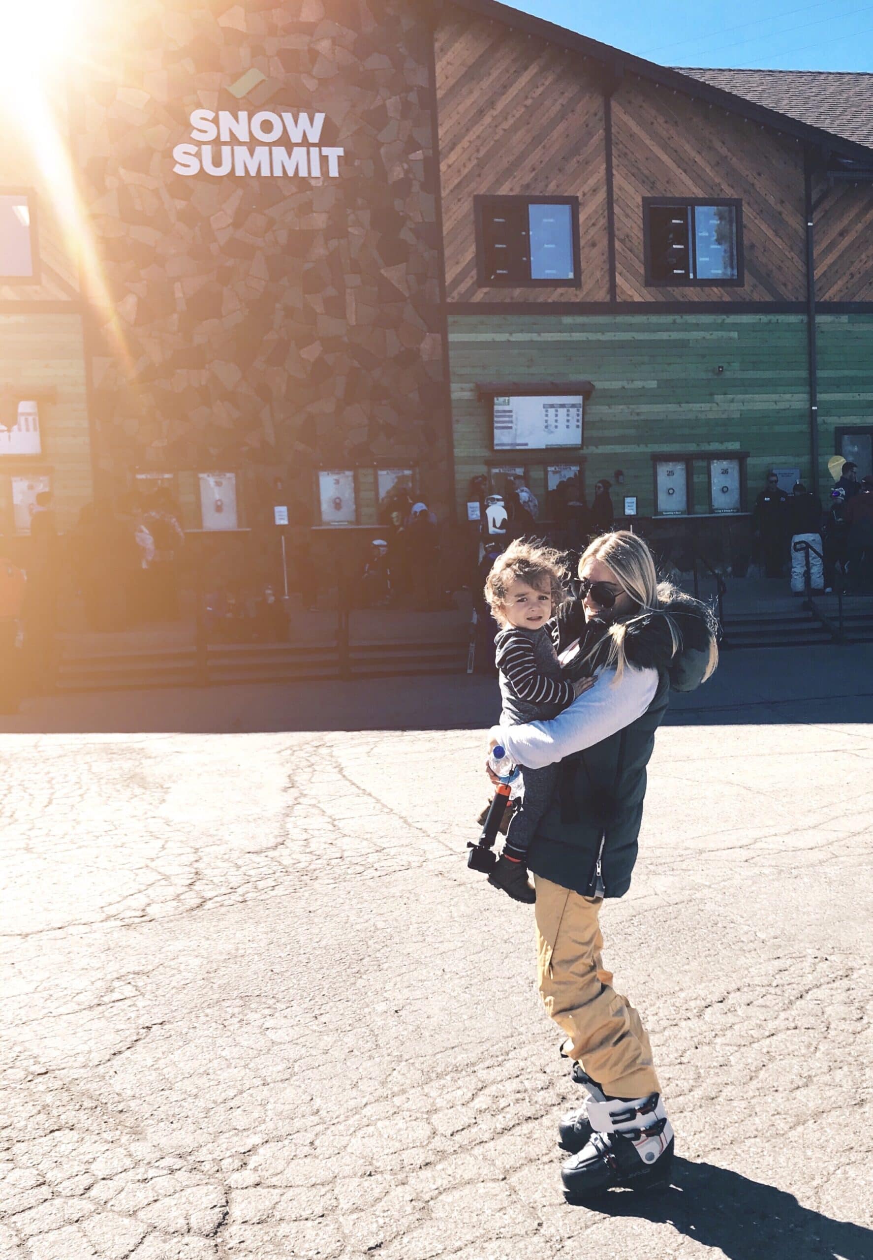 mom and baby at ski resort