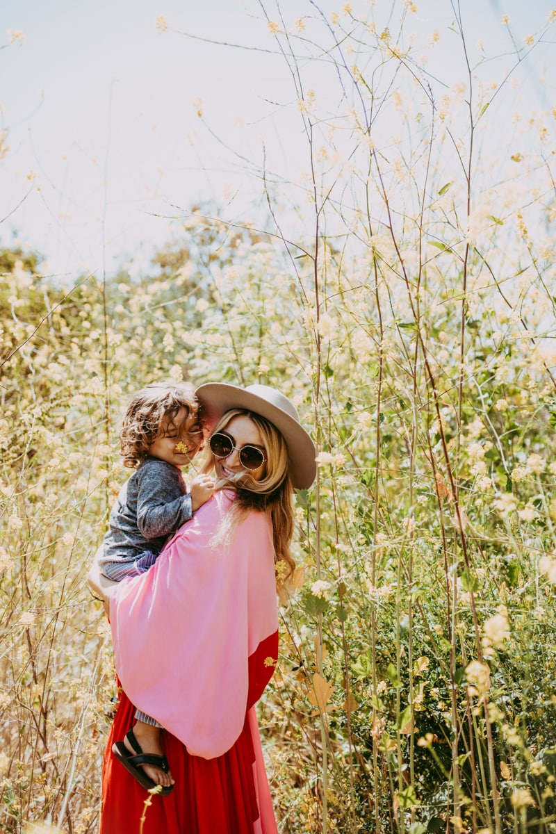 mother and baby in field