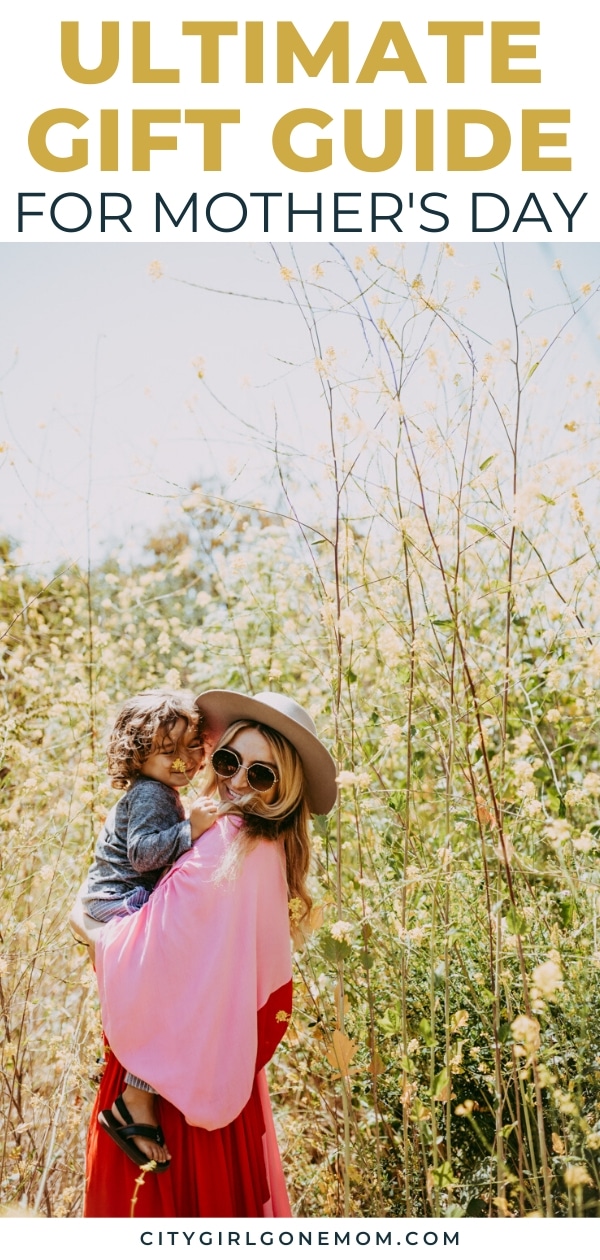 mom and baby in field