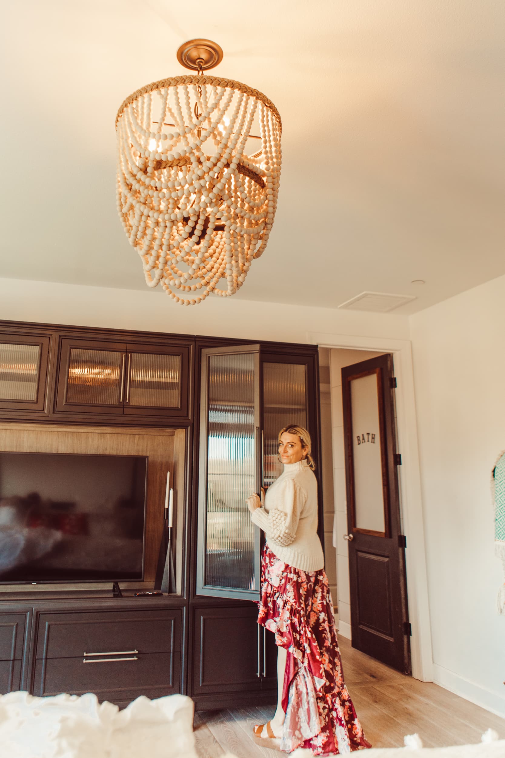 woman looking through cabinets