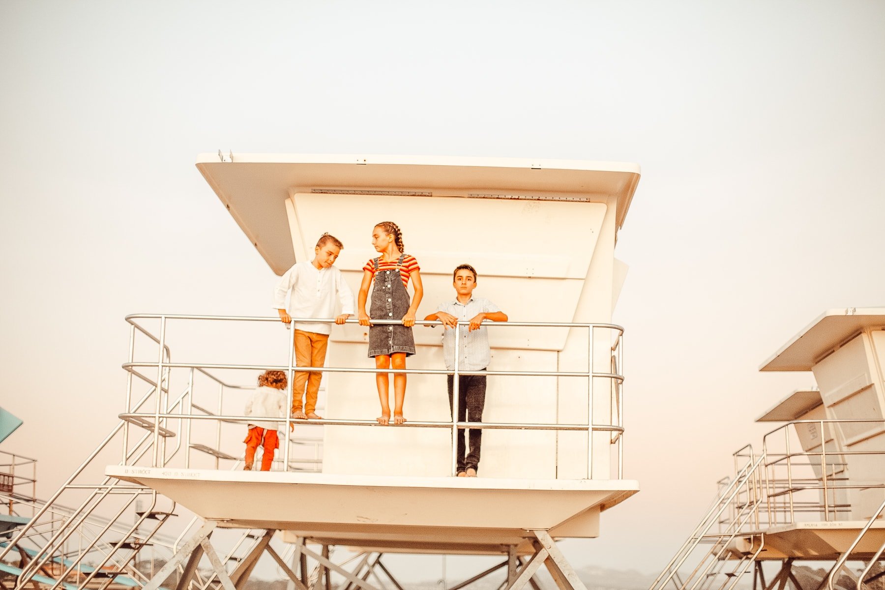 kids on lifeguard tower