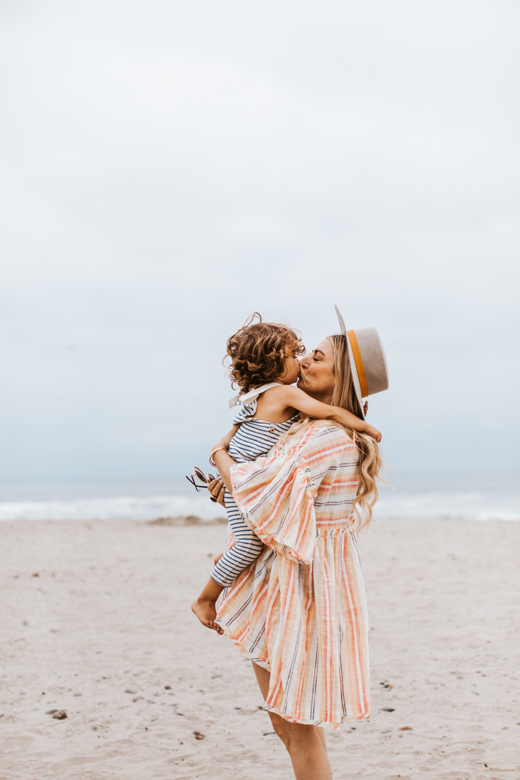 mom and baby on beach