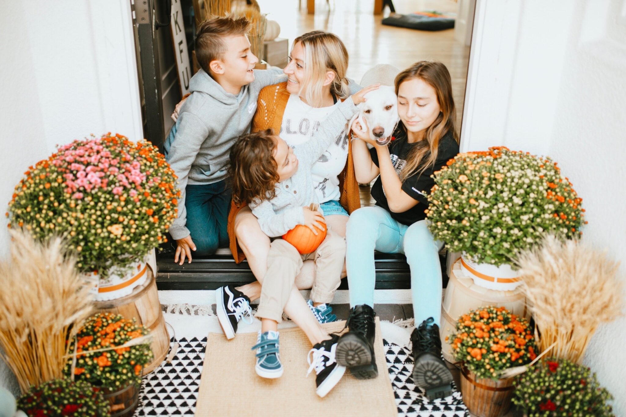 mom with her kids and dog