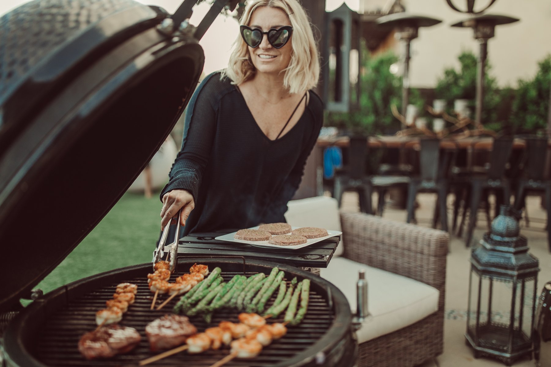 woman cooking on the grill