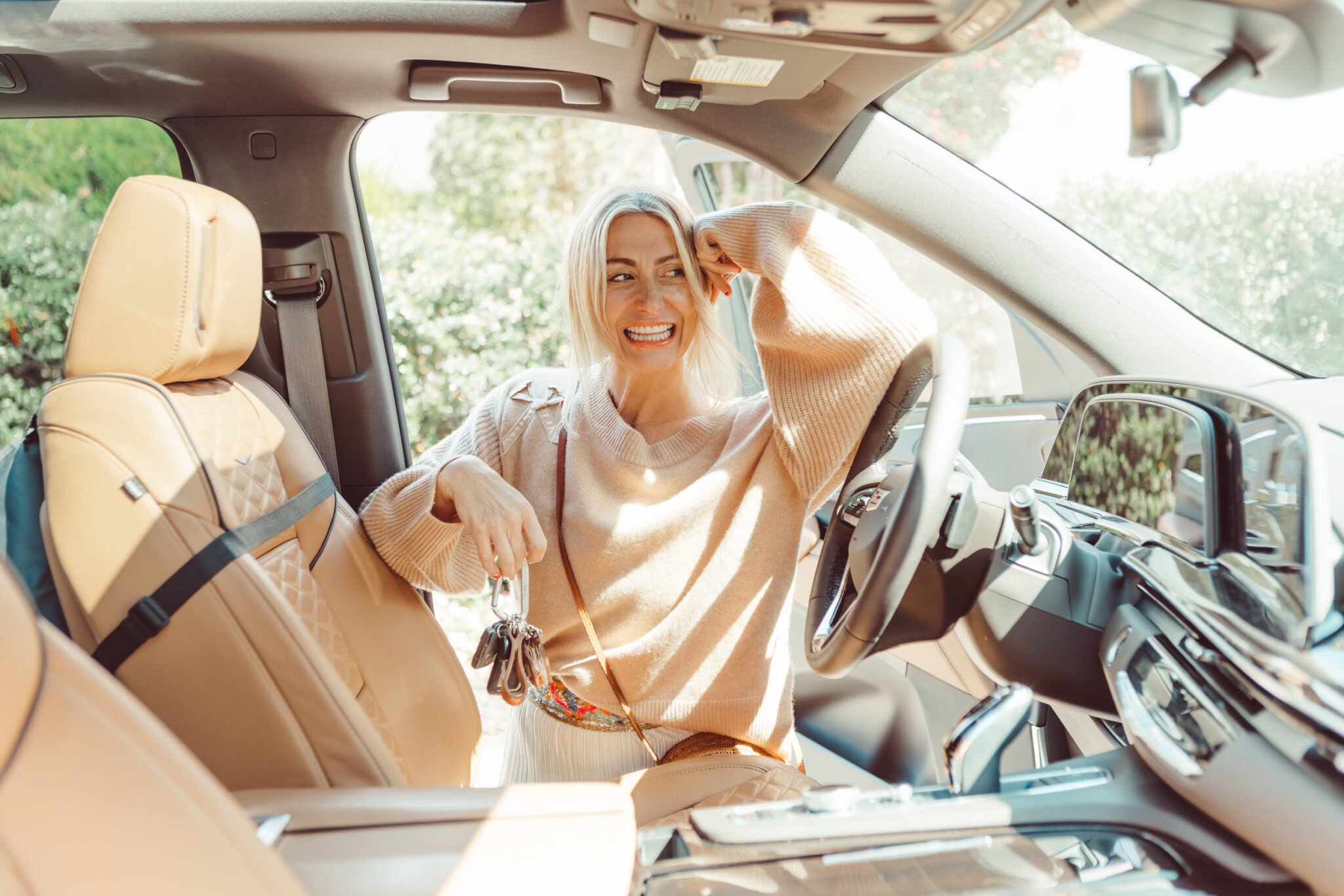 woman getting in her car