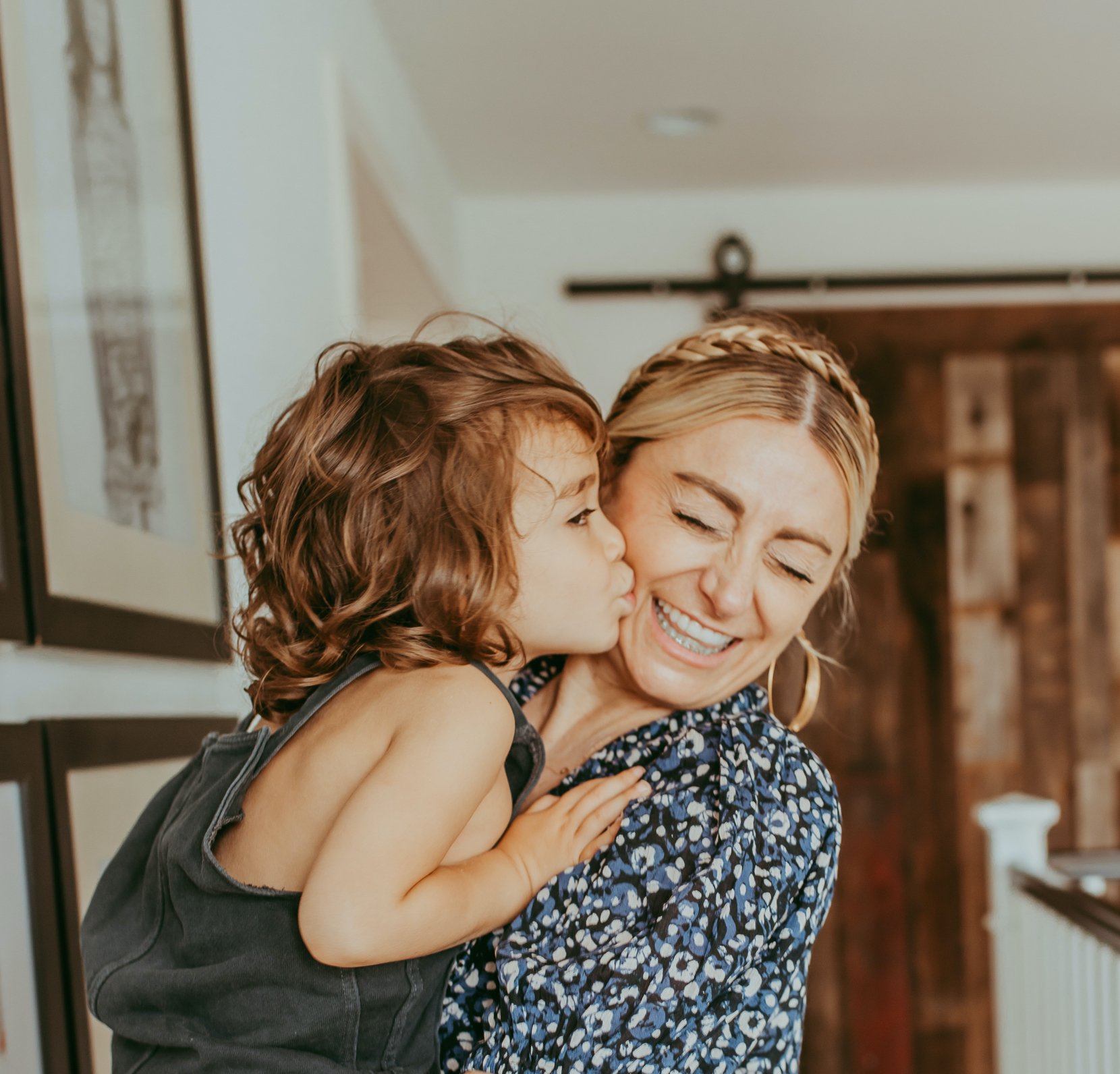 mom and son kissing