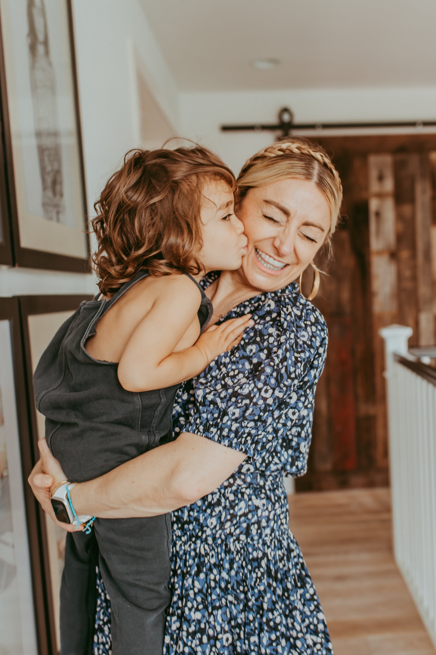 mom and child kiss