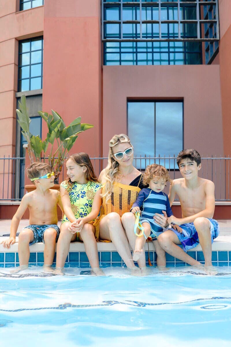 mom and kids at pool