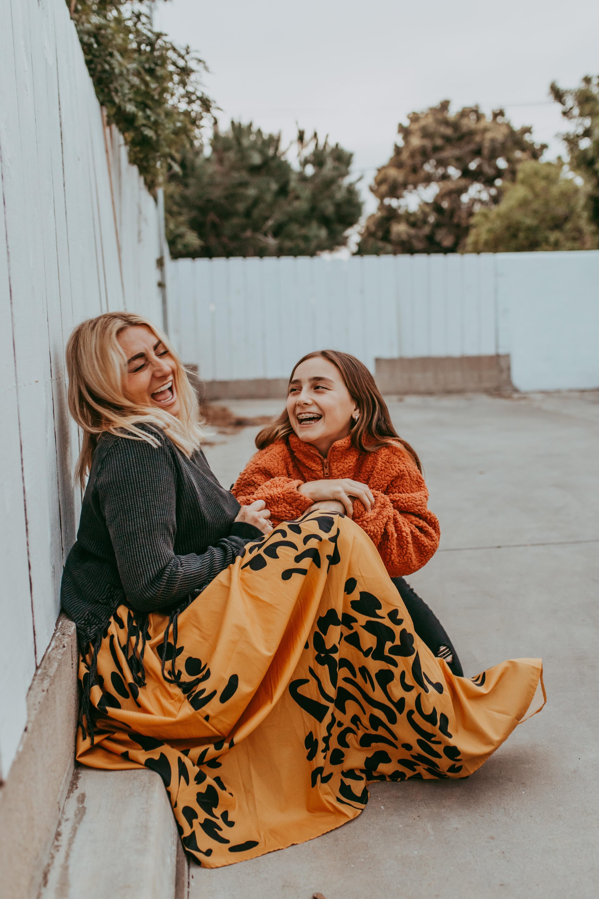 mom and daughter laughing