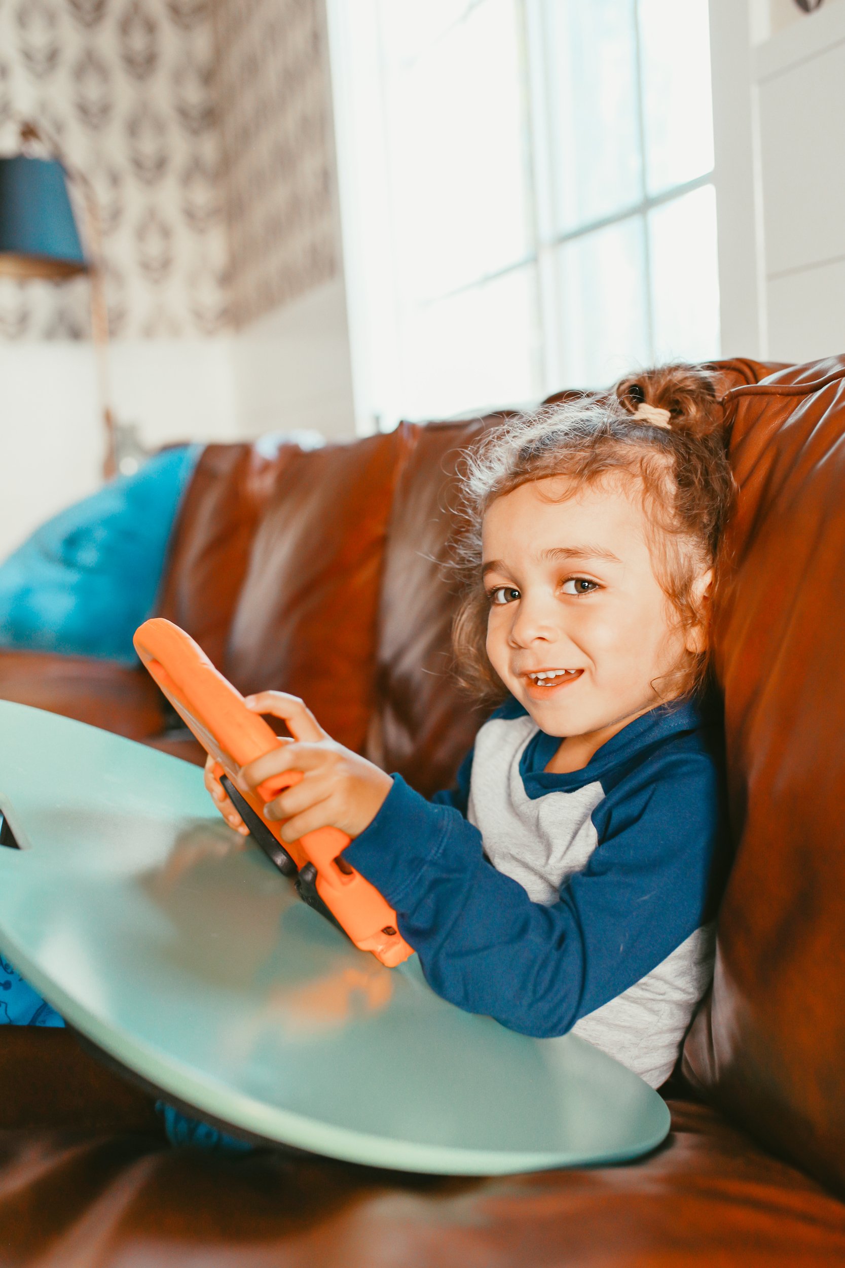 boy playing on tablet