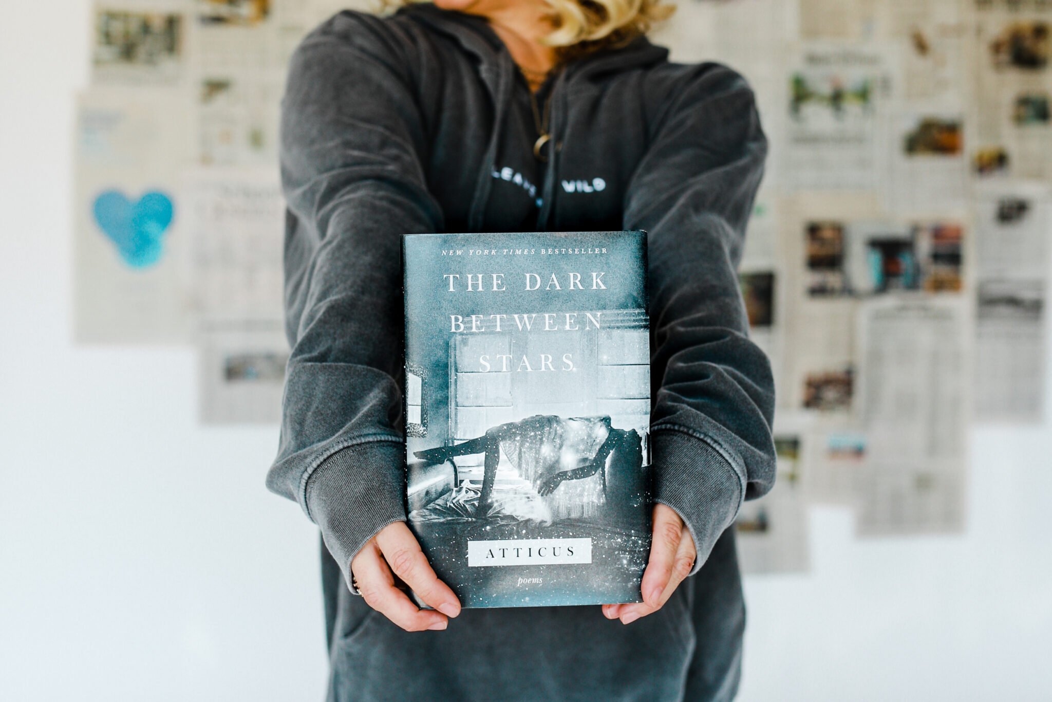 woman holding book