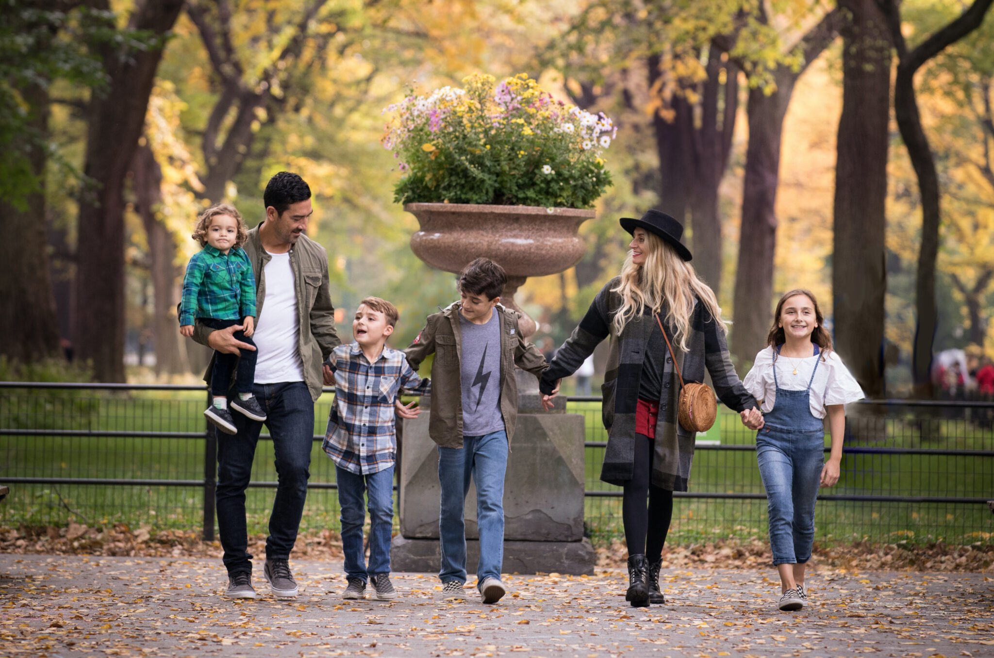 family walking in central park