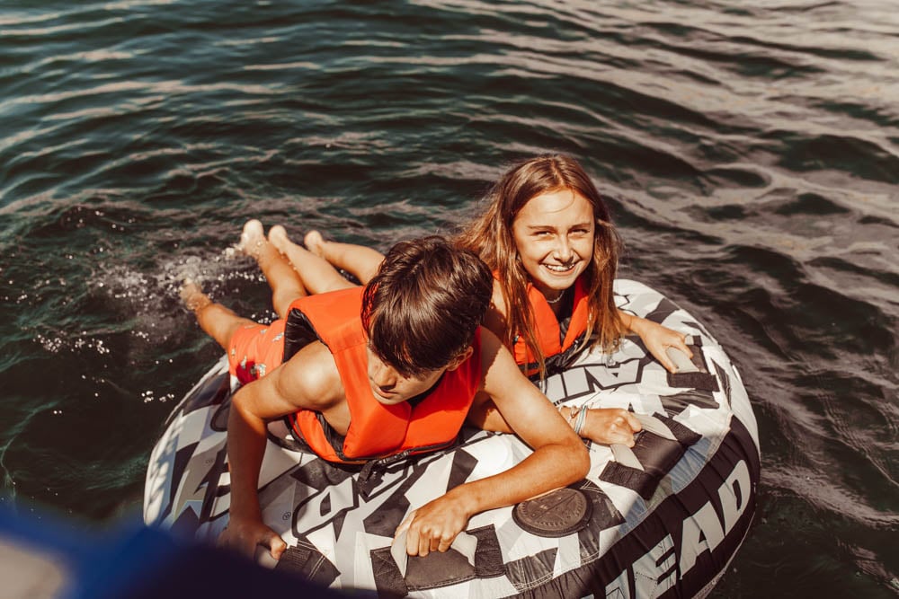 kids in an inner tube