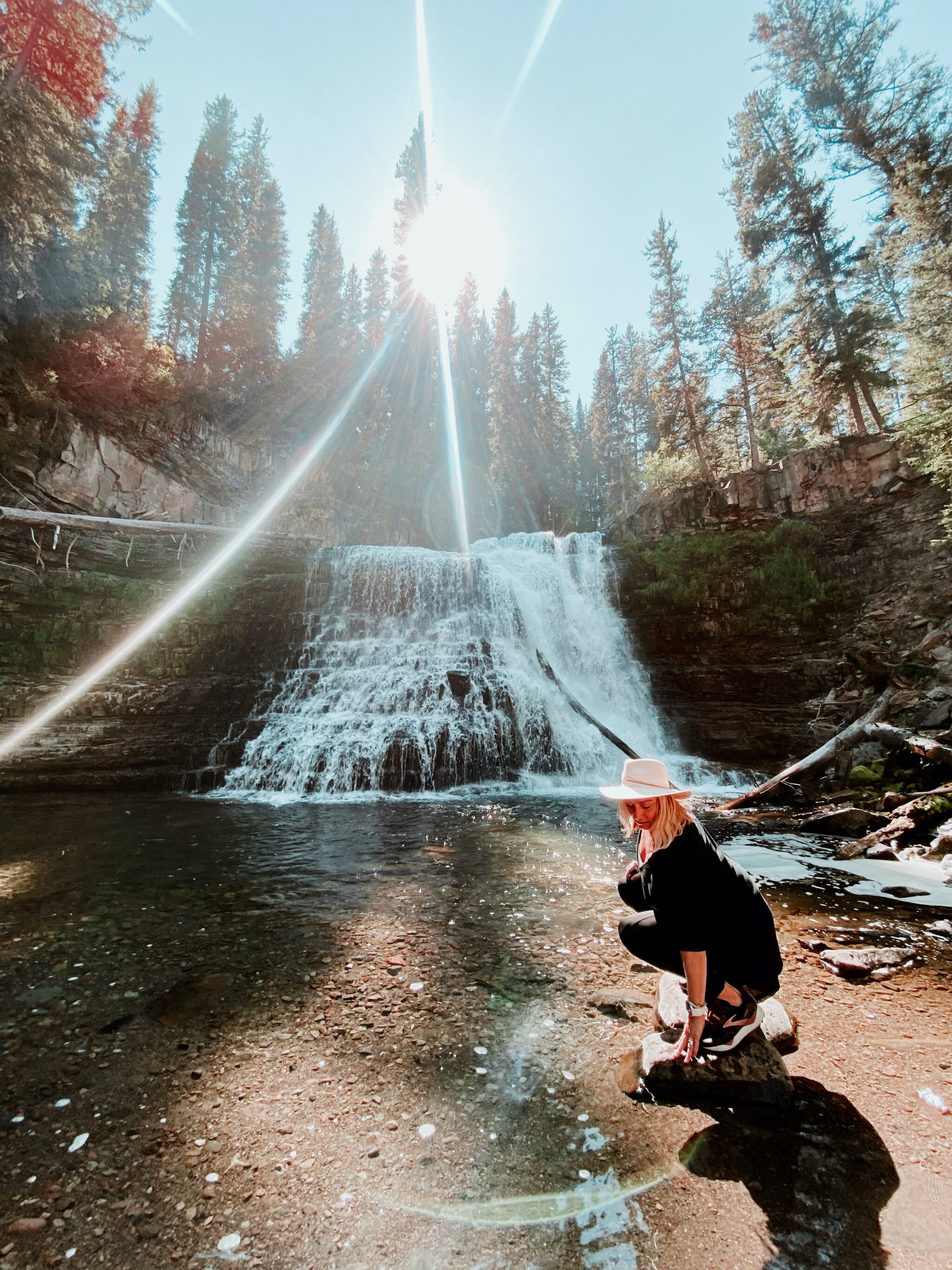 woman at waterfall