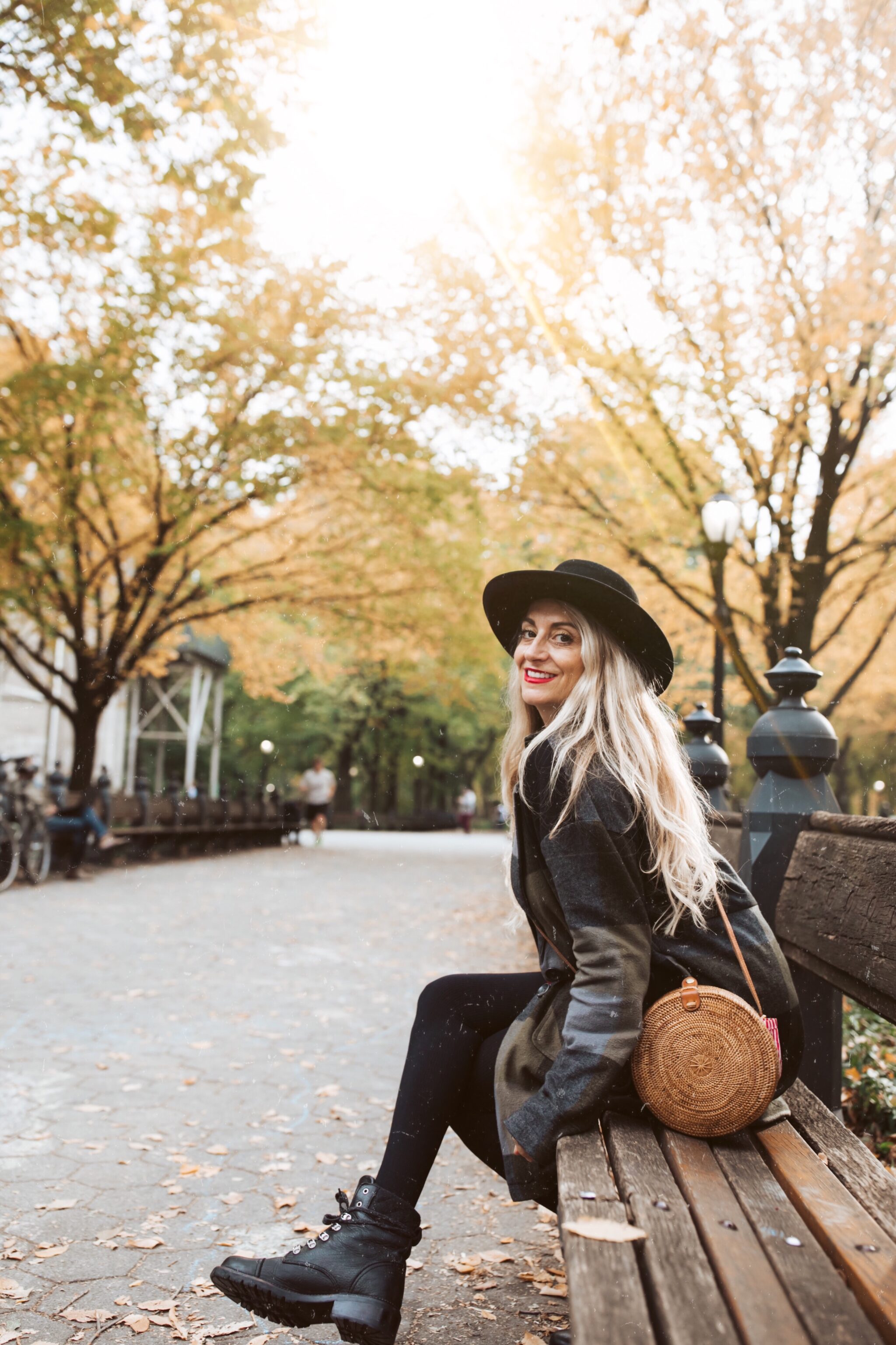 woman sitting on park bench