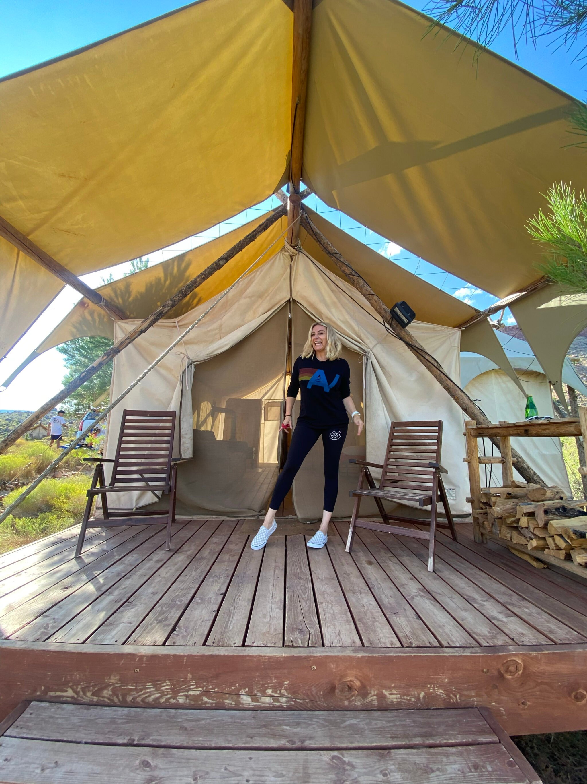 woman standing by tent