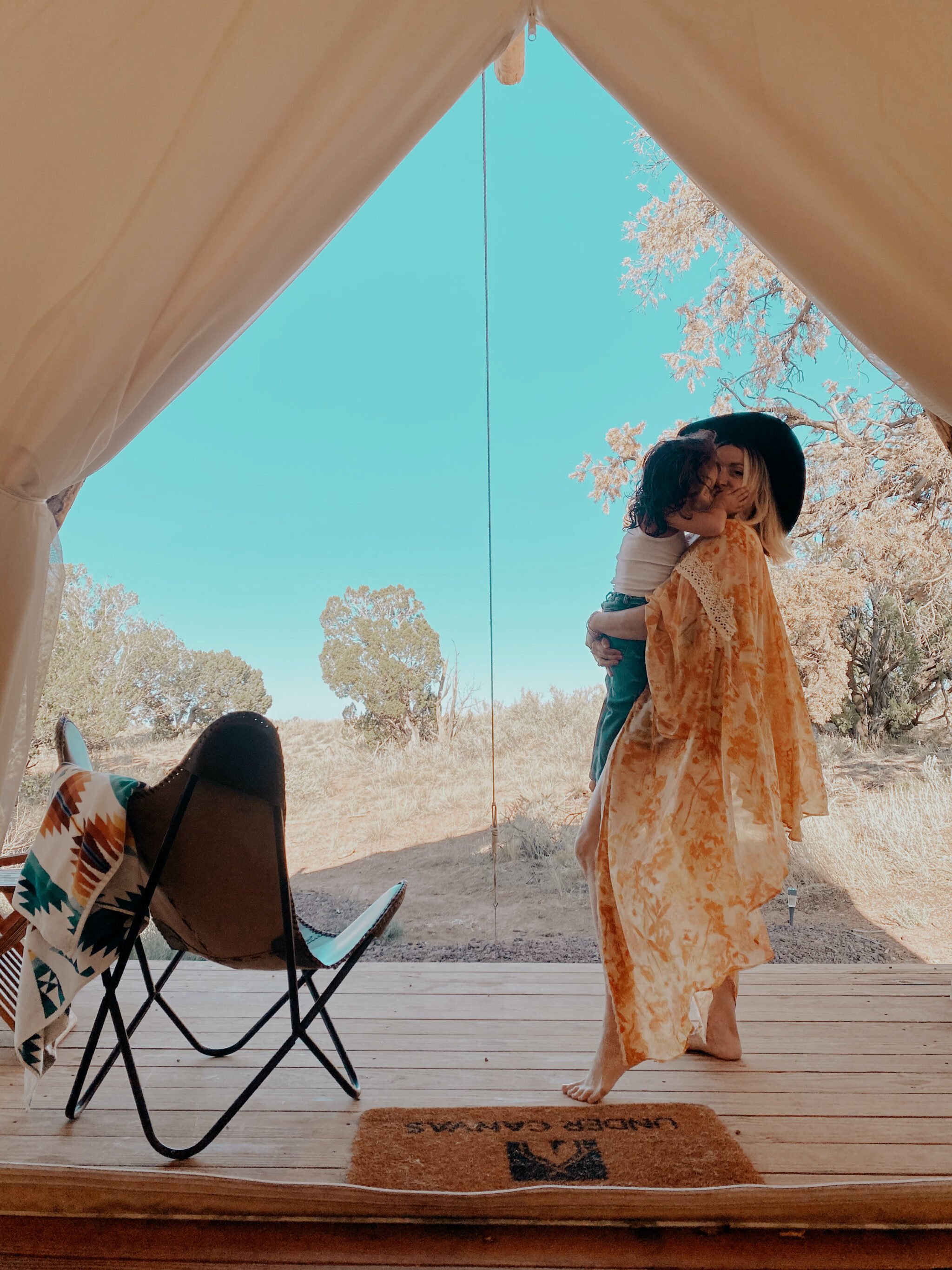 mom and baby in tent