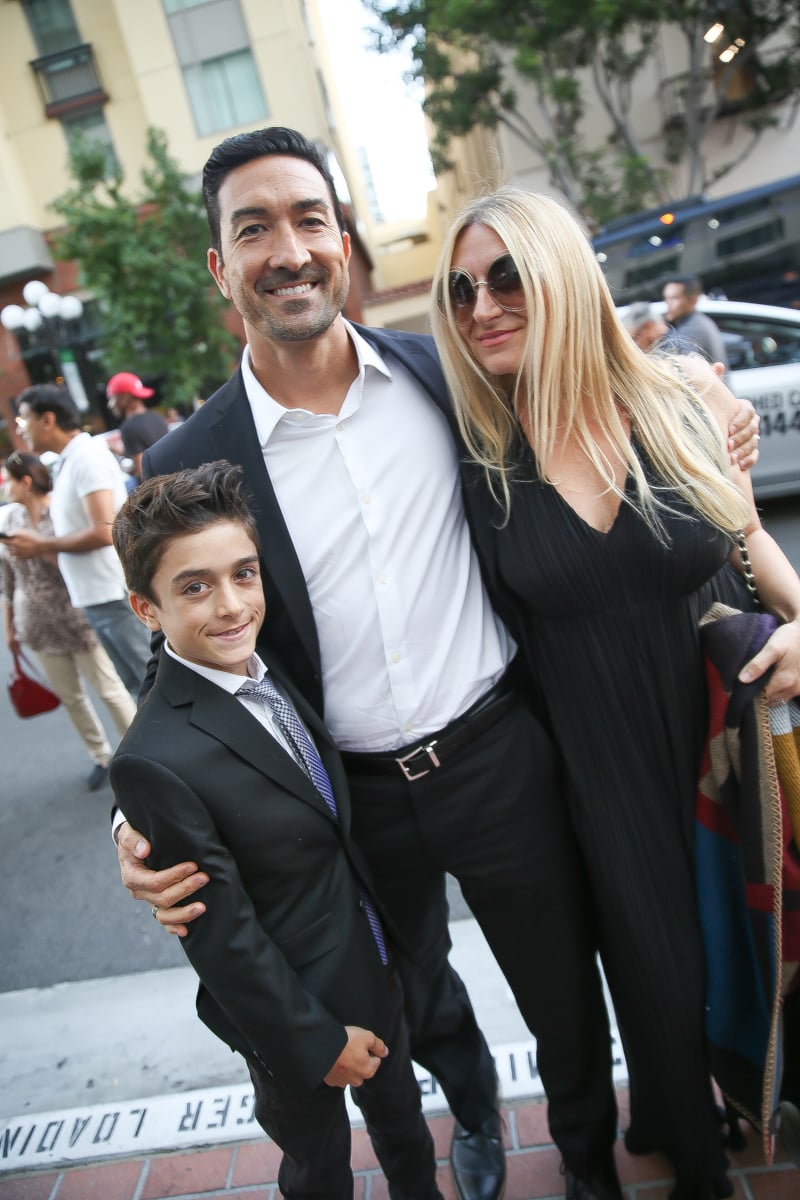 family at movie premiere