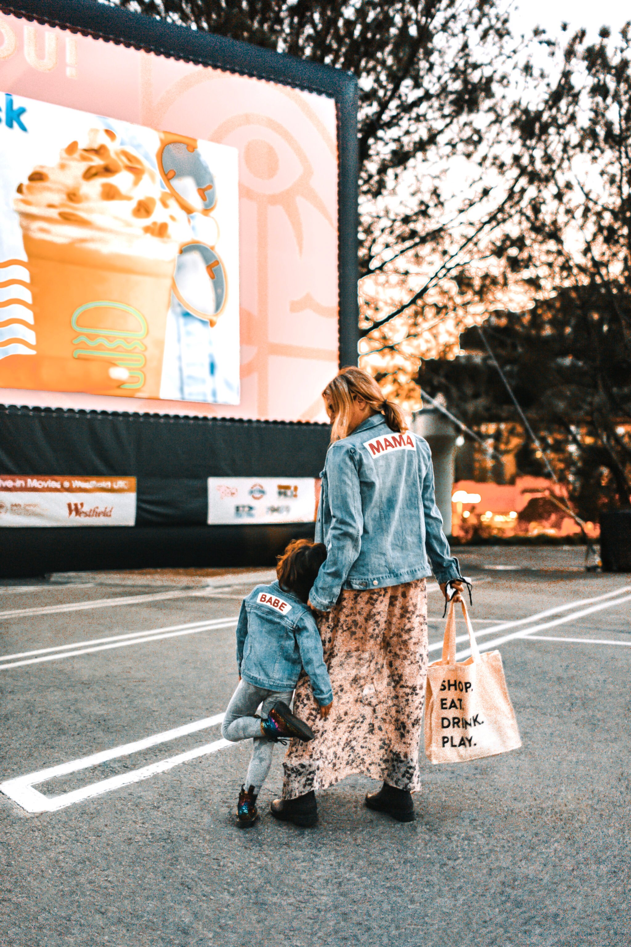 mom and toddler at drive-in