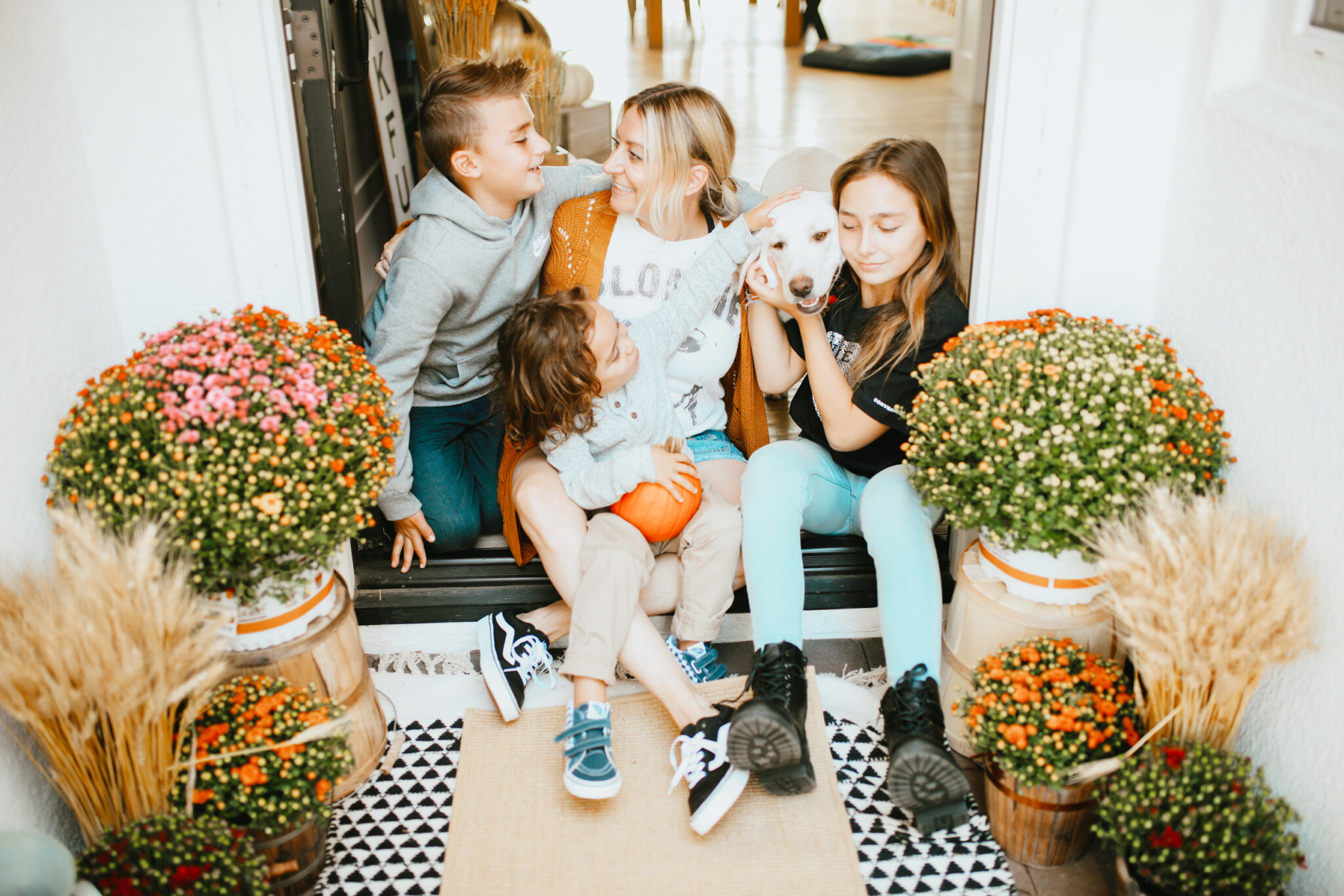 mom with kids on porch