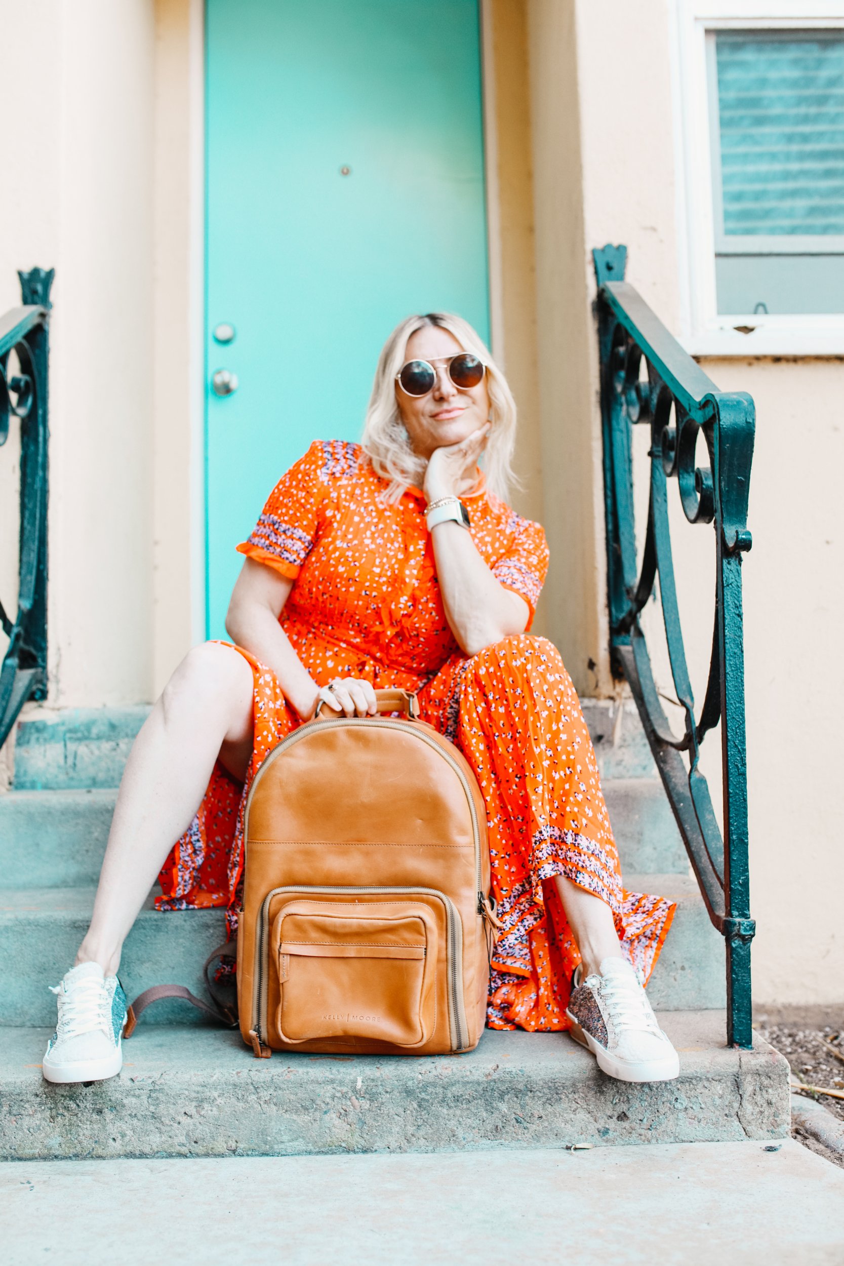 woman sitting with backpack