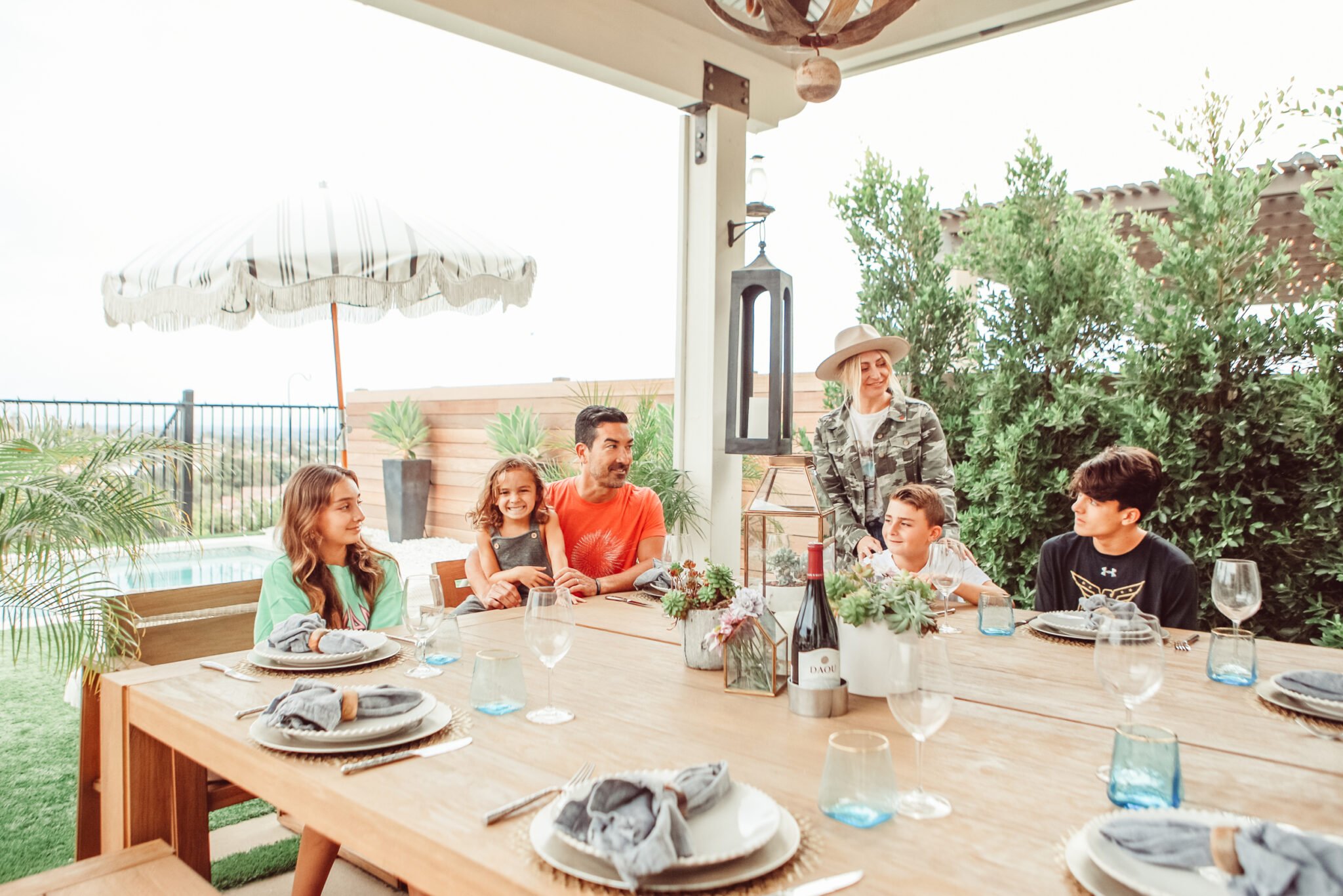 family dining on the patio