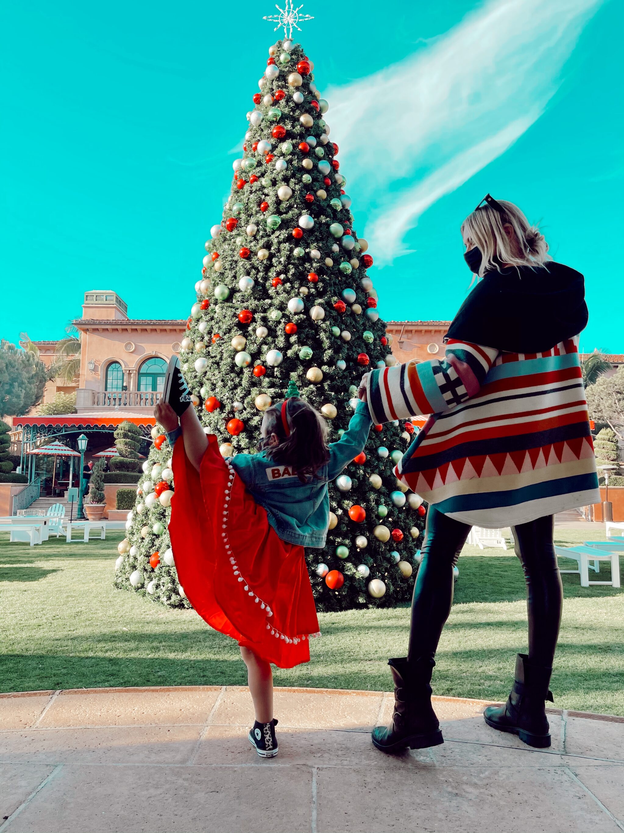 mom and child by christmas tree