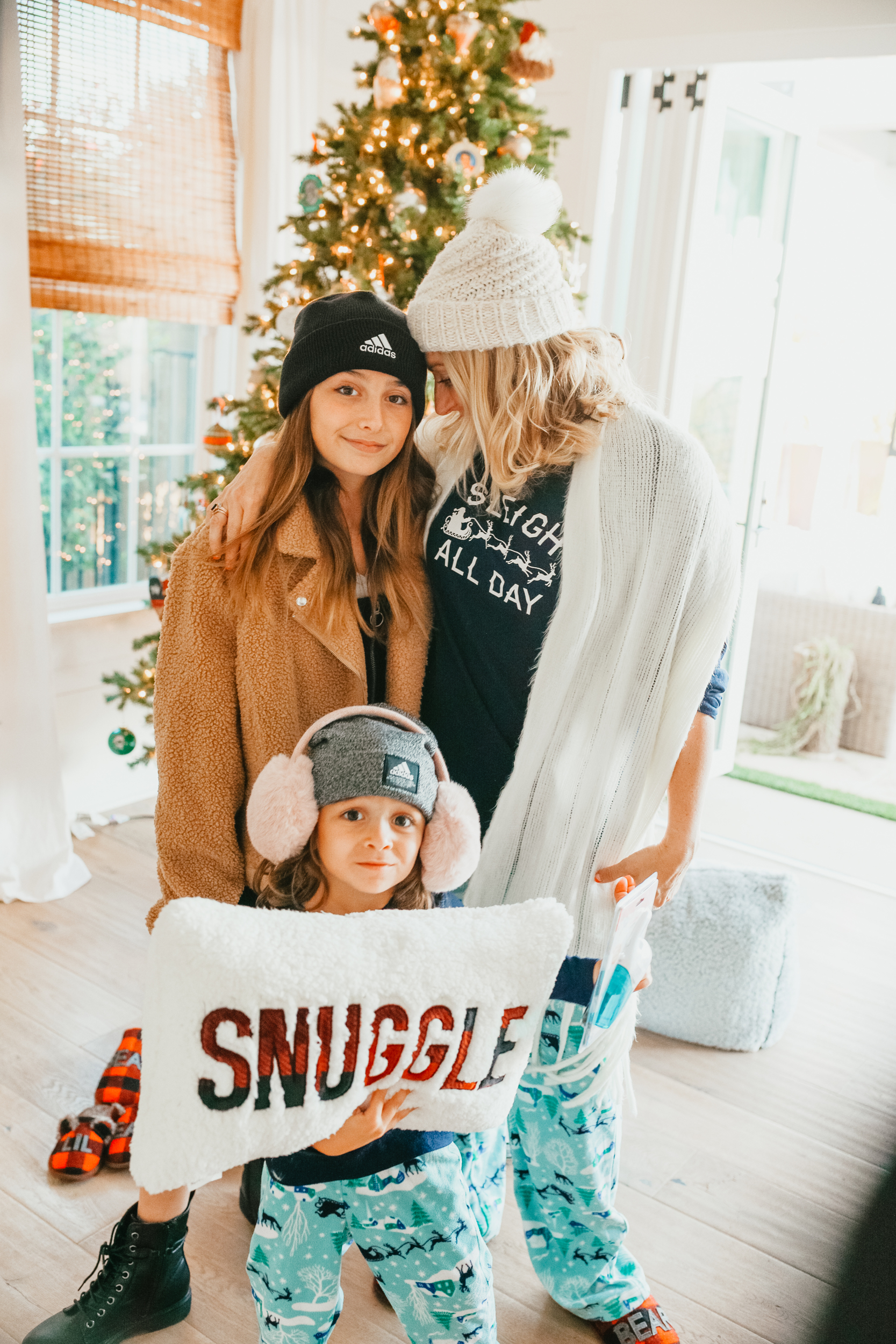 mom with kids at christmas