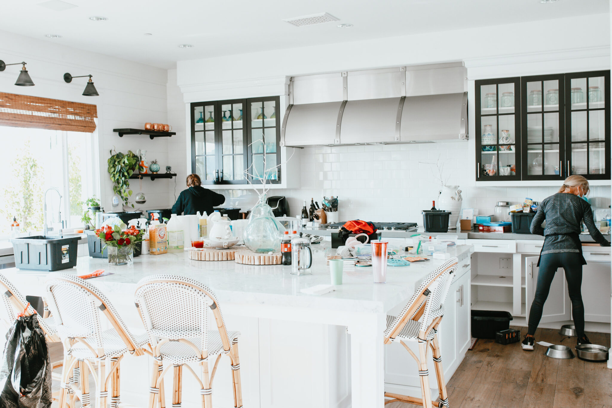 women cleaning a kitchen