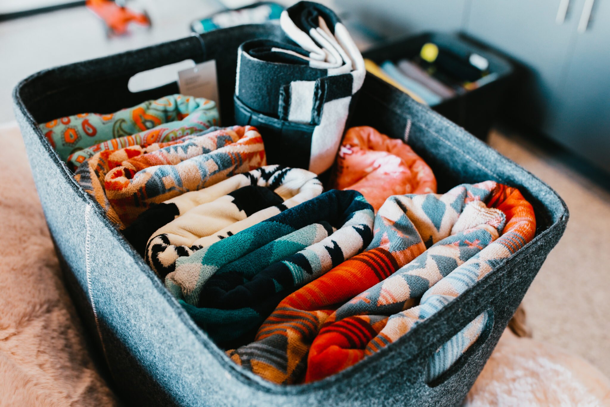 folded towels in organized box